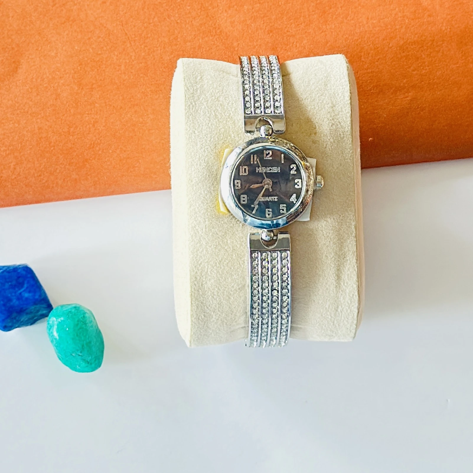 silver-toned women's quartz bracelet watch