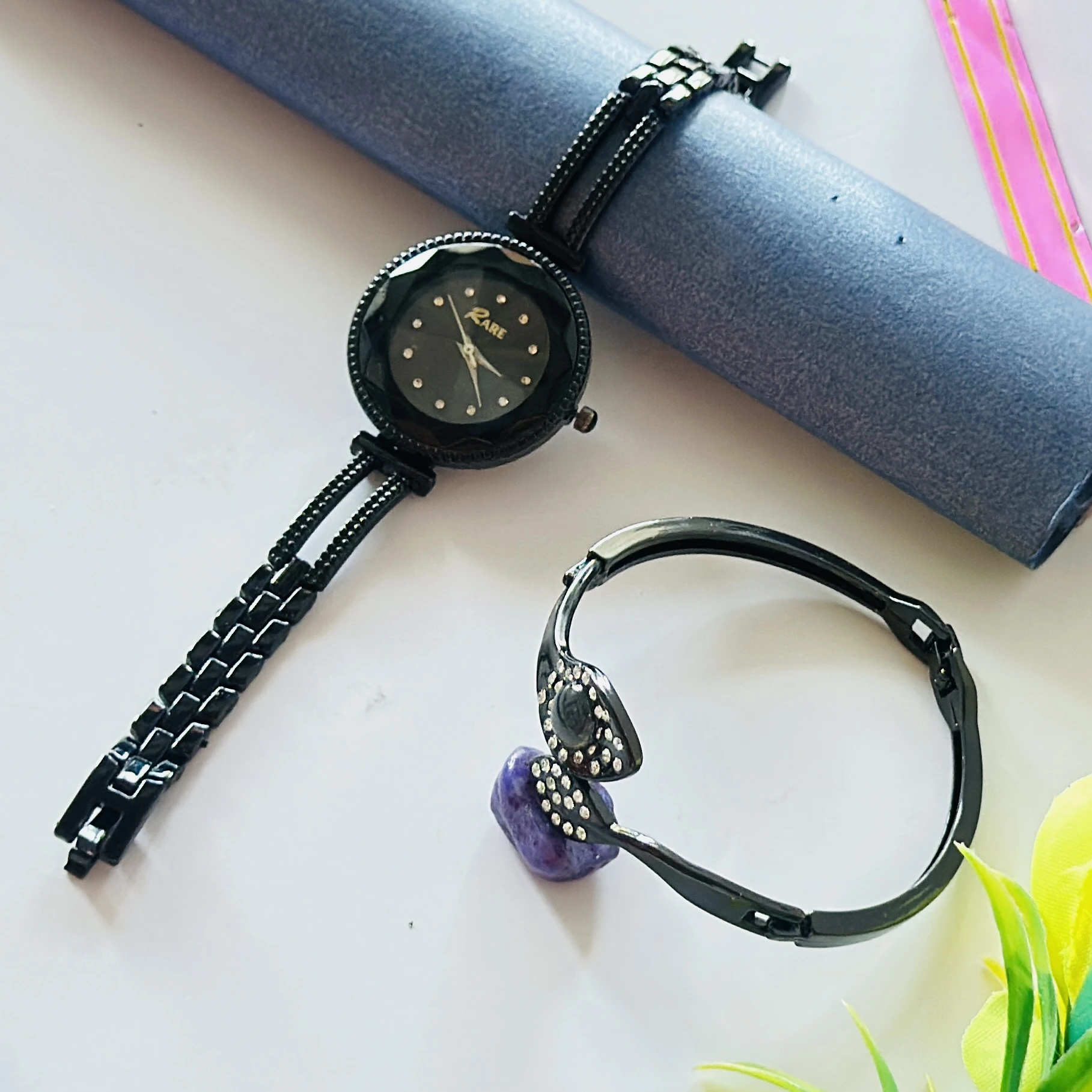 Black metal analog wristwatch and matching studded bracelet combo set