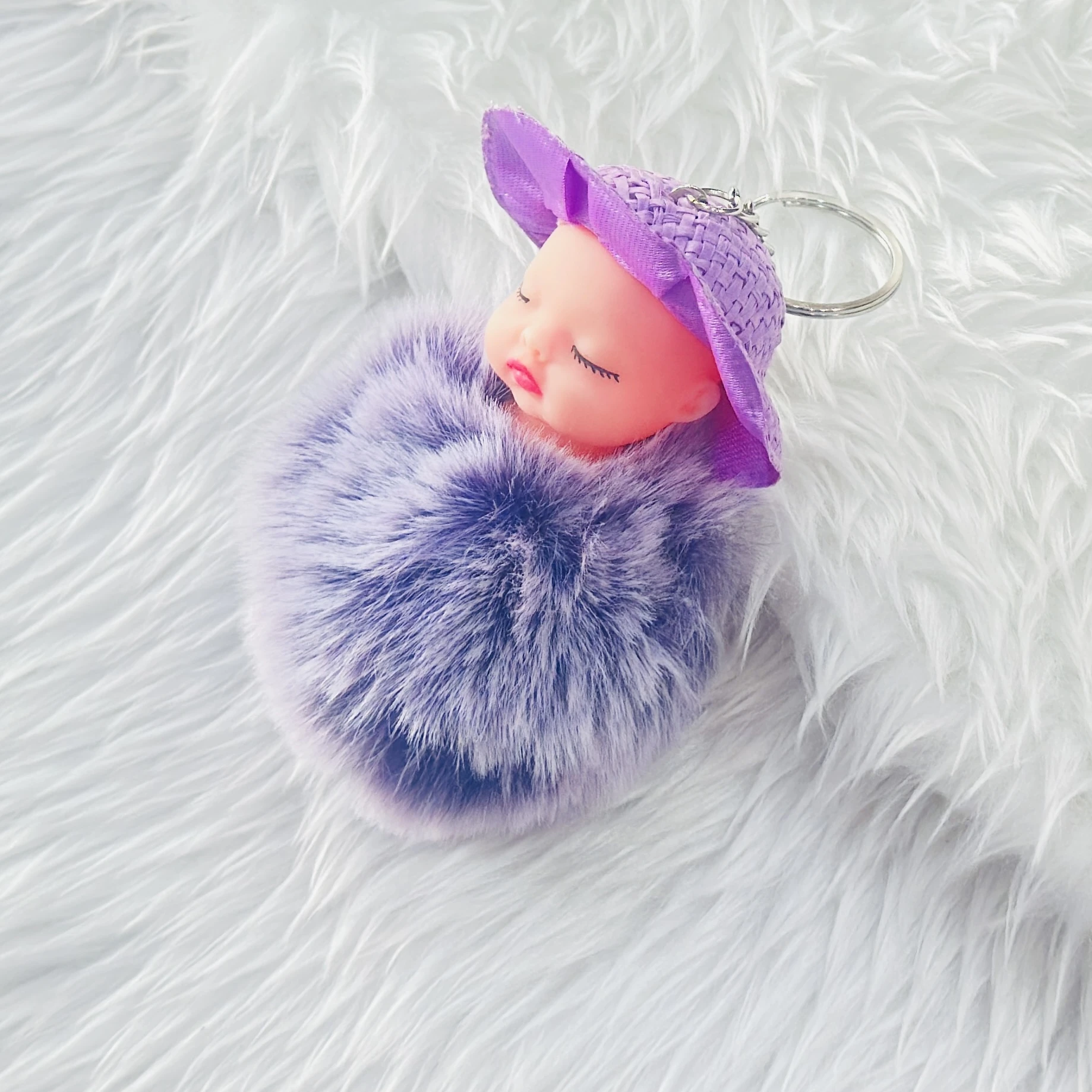 sleeping baby doll fluffy pom pom keychain
