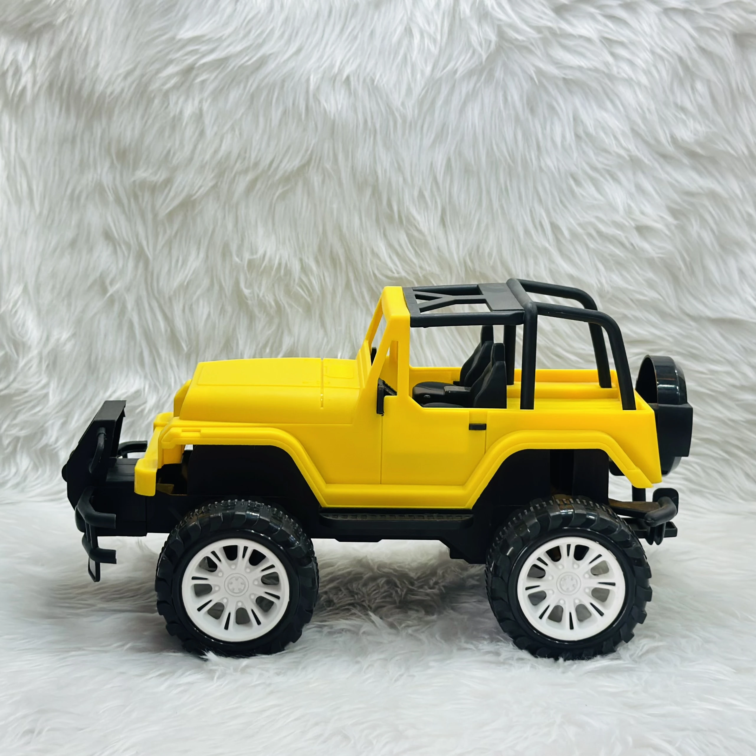 Yellow plastic toy jeep