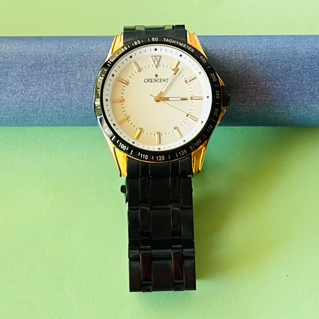 men's analog watch from the Crescent collection, likely by Guess.