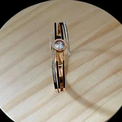 elegant gold-plated crystal-studded cuff bracelet