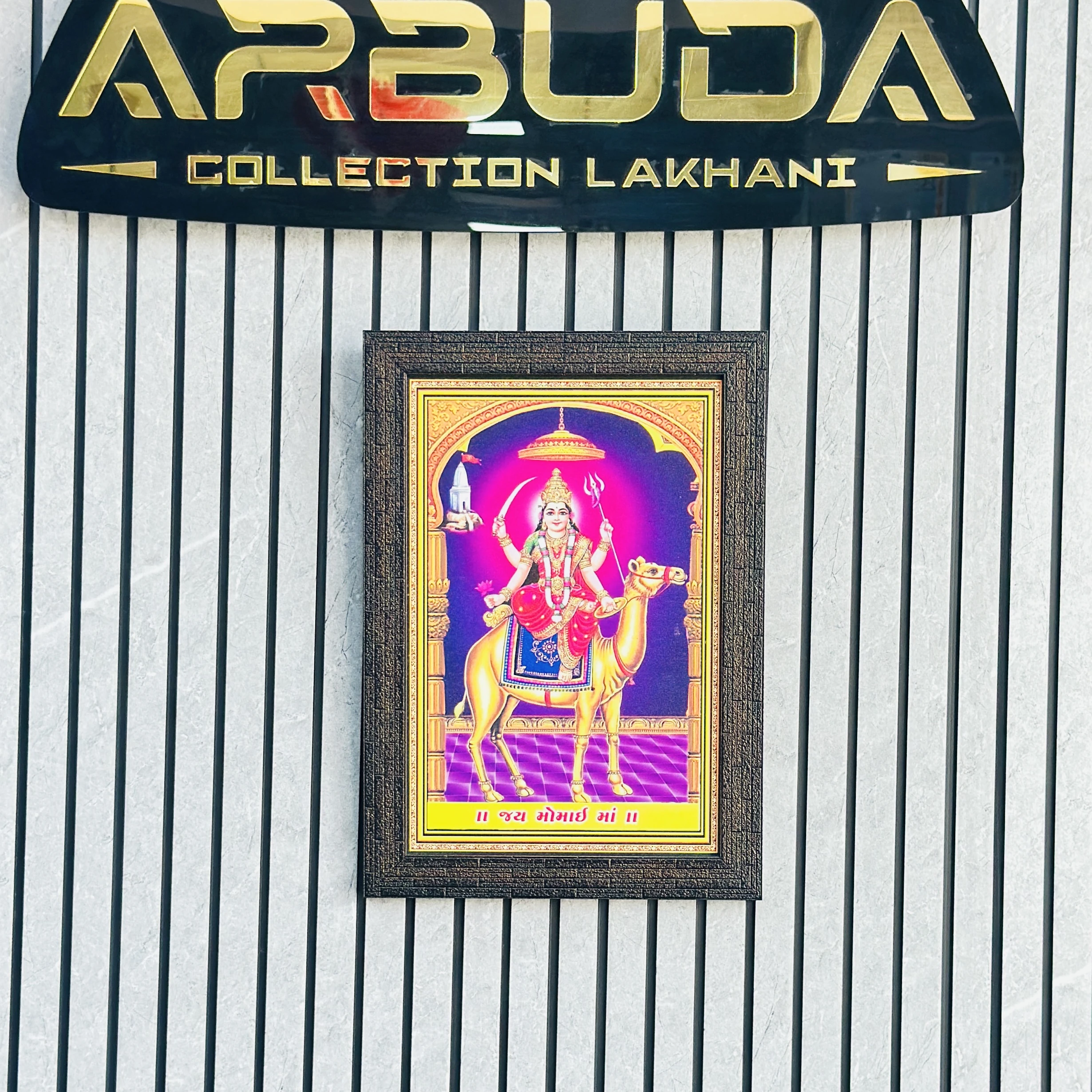 Goddess Momai Maa riding a camel