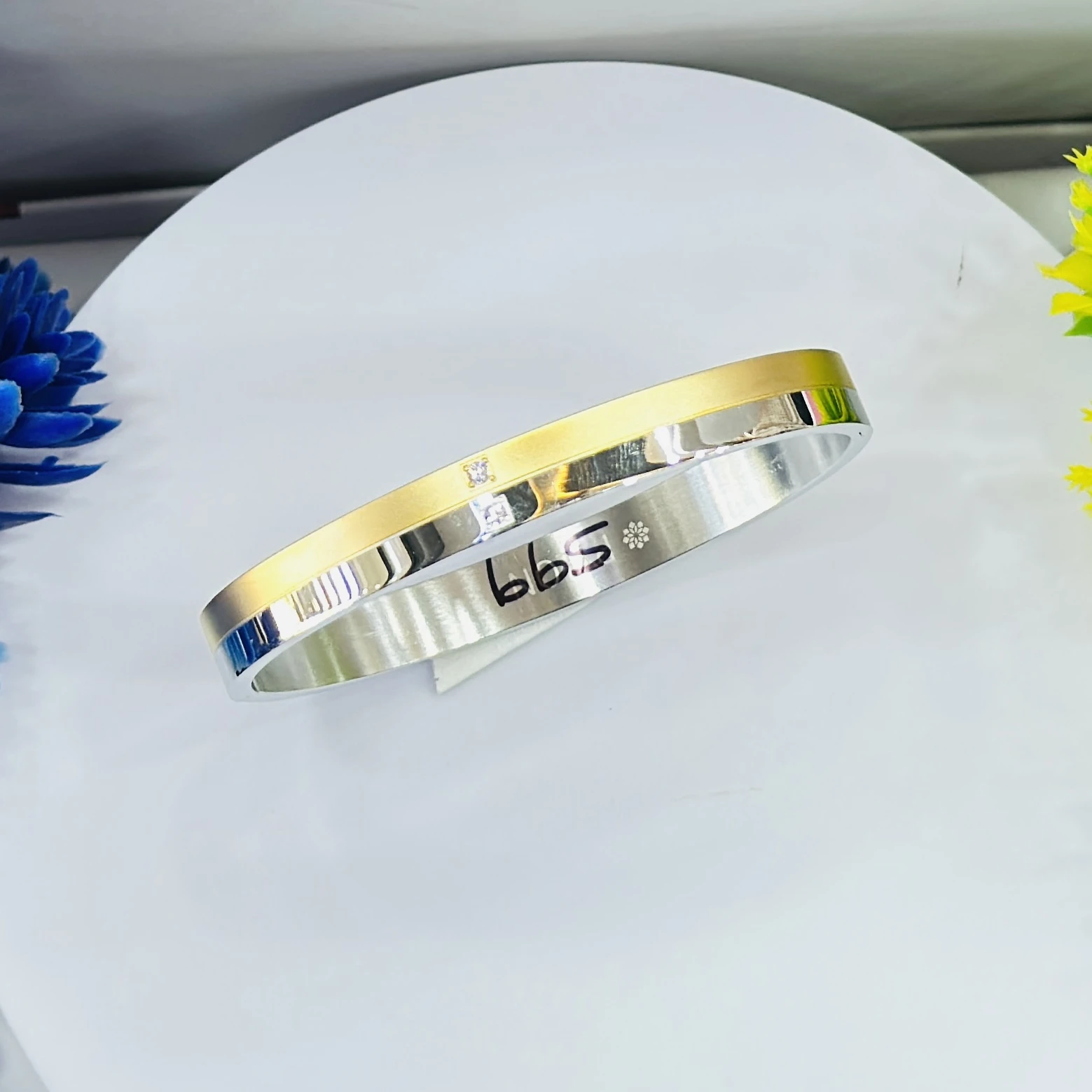 stylish two-tone kada is a stainless steel bracelet