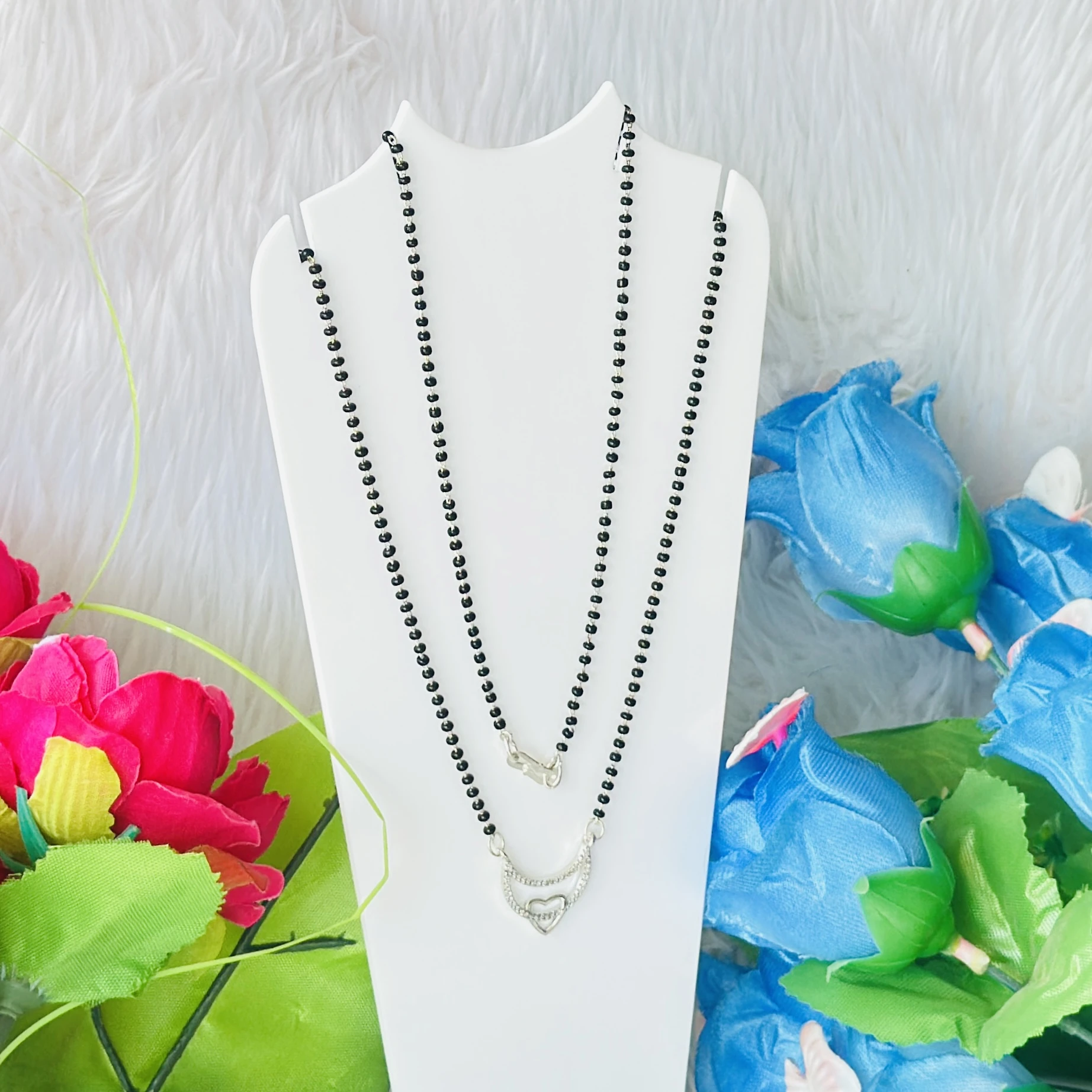 silver-plated American diamond studded and beaded mangalsutra.