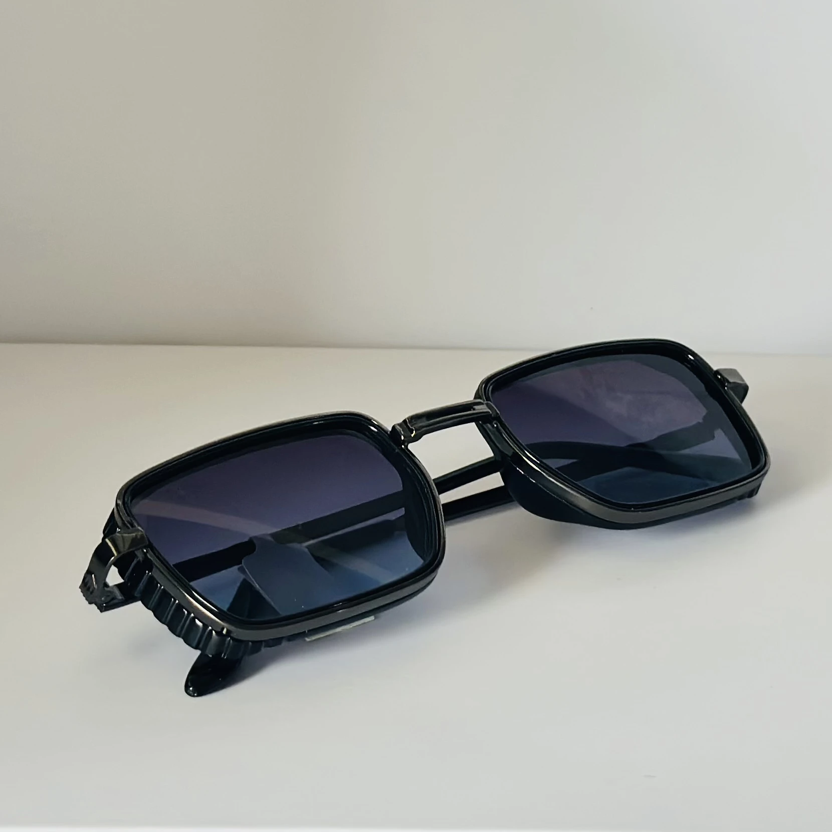 pair of Aedoll Goggle sunglasses with a gold metal frame and pink gradient lenses.