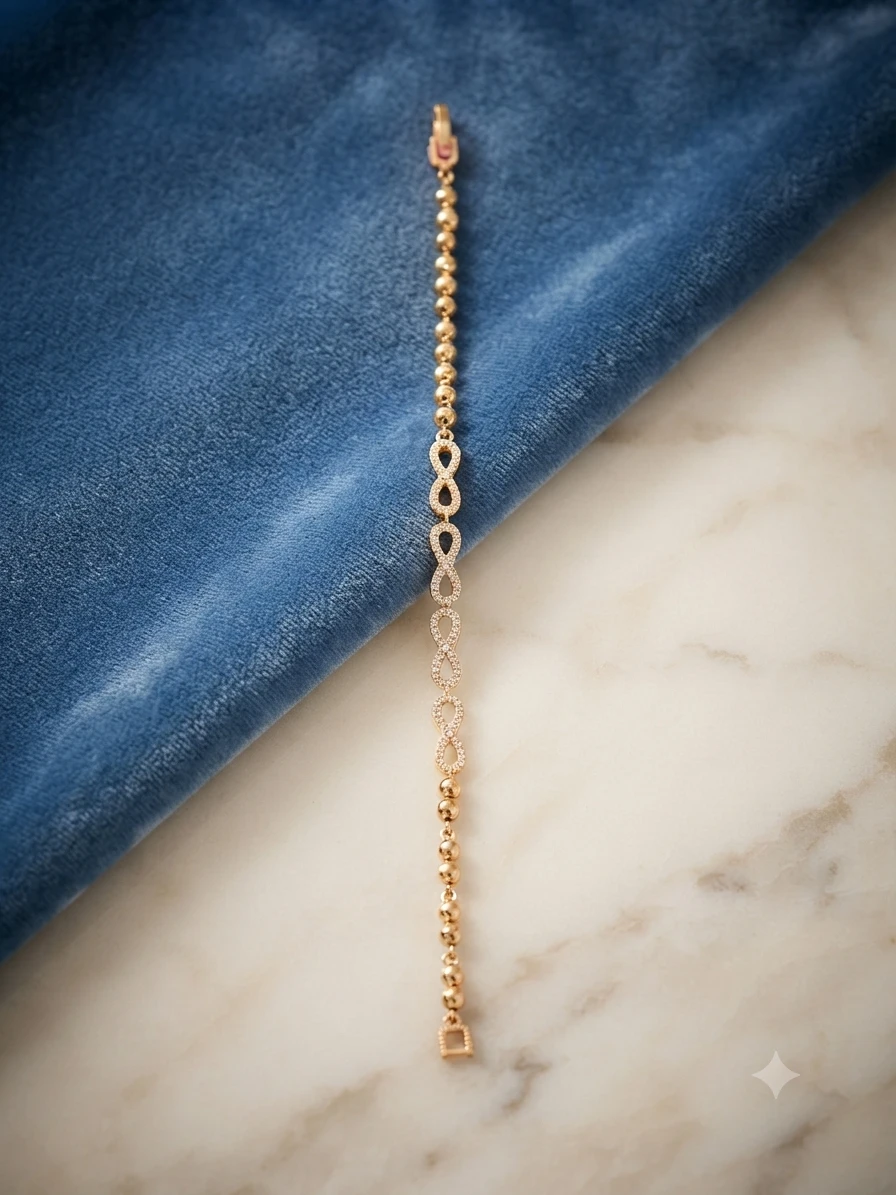 Gold tone fancy breslet