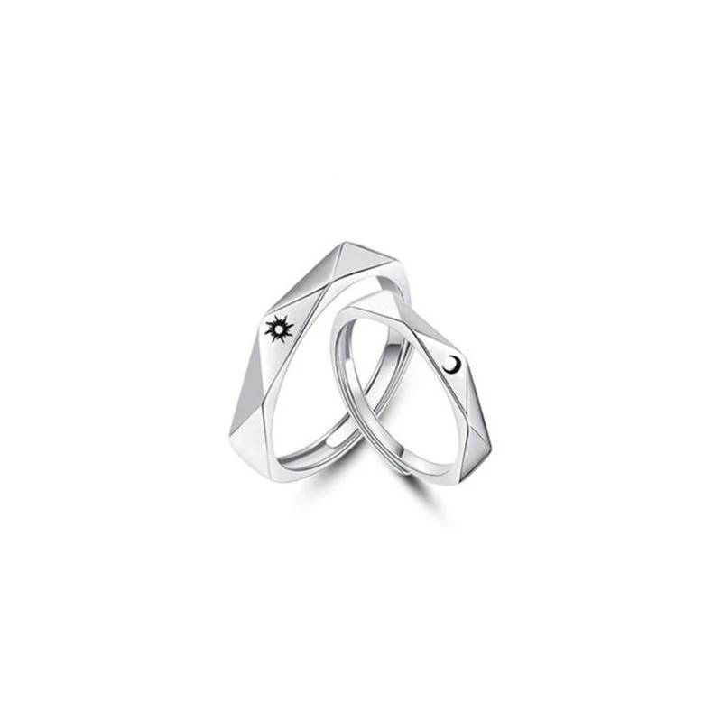 Set of silver-toned couple rings
