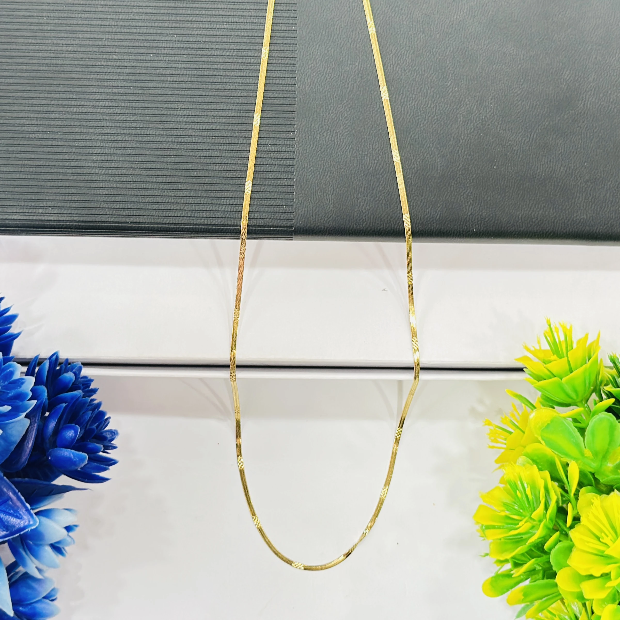 premium gold-plated herringbone snake chain.