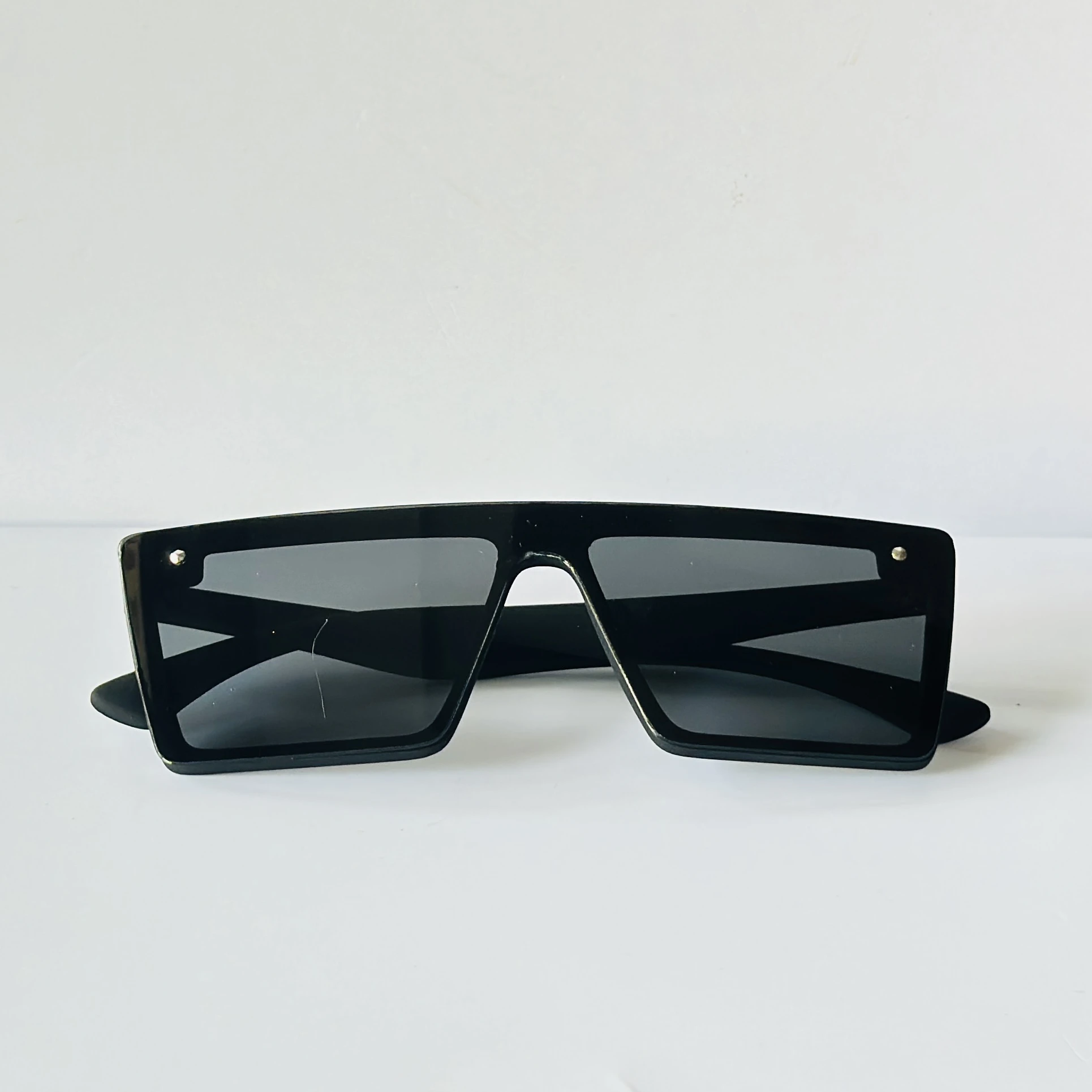 Black sunglasses are a retro square