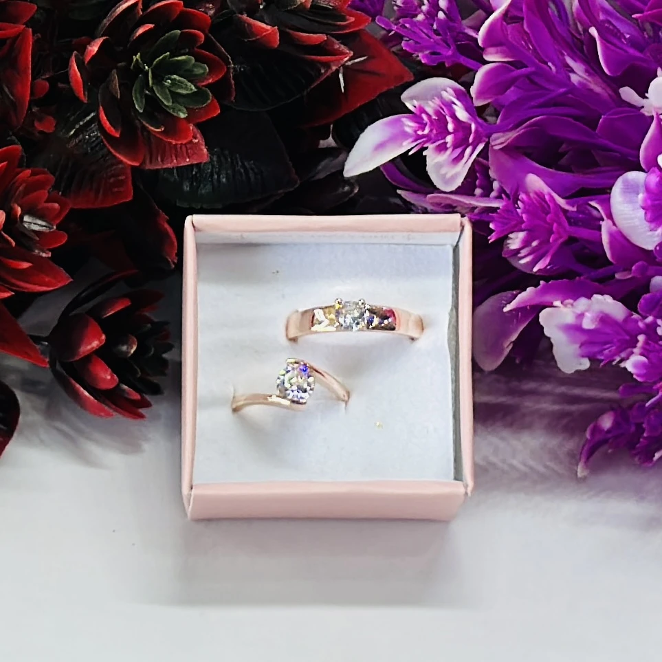 rose gold-plated cubic zirconia couple rings.