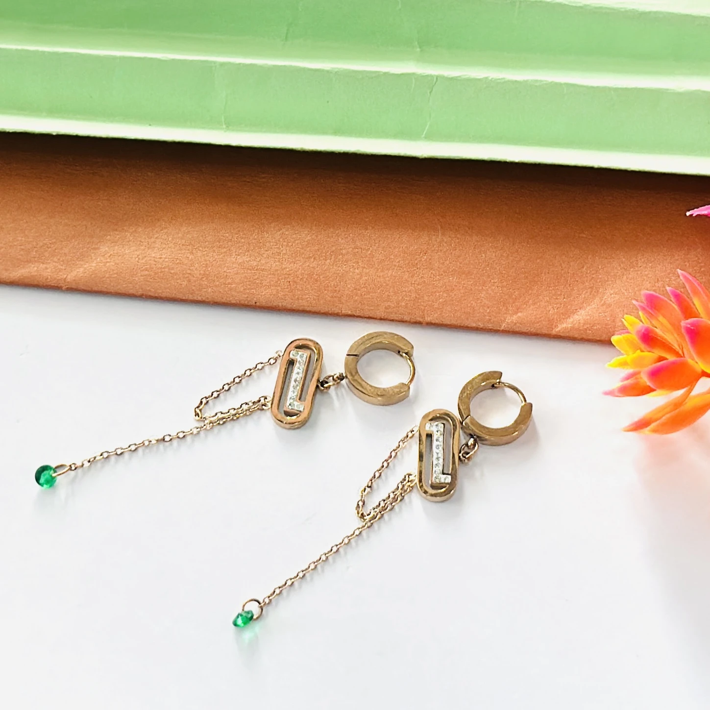 Rose gold and diamond drop earrings