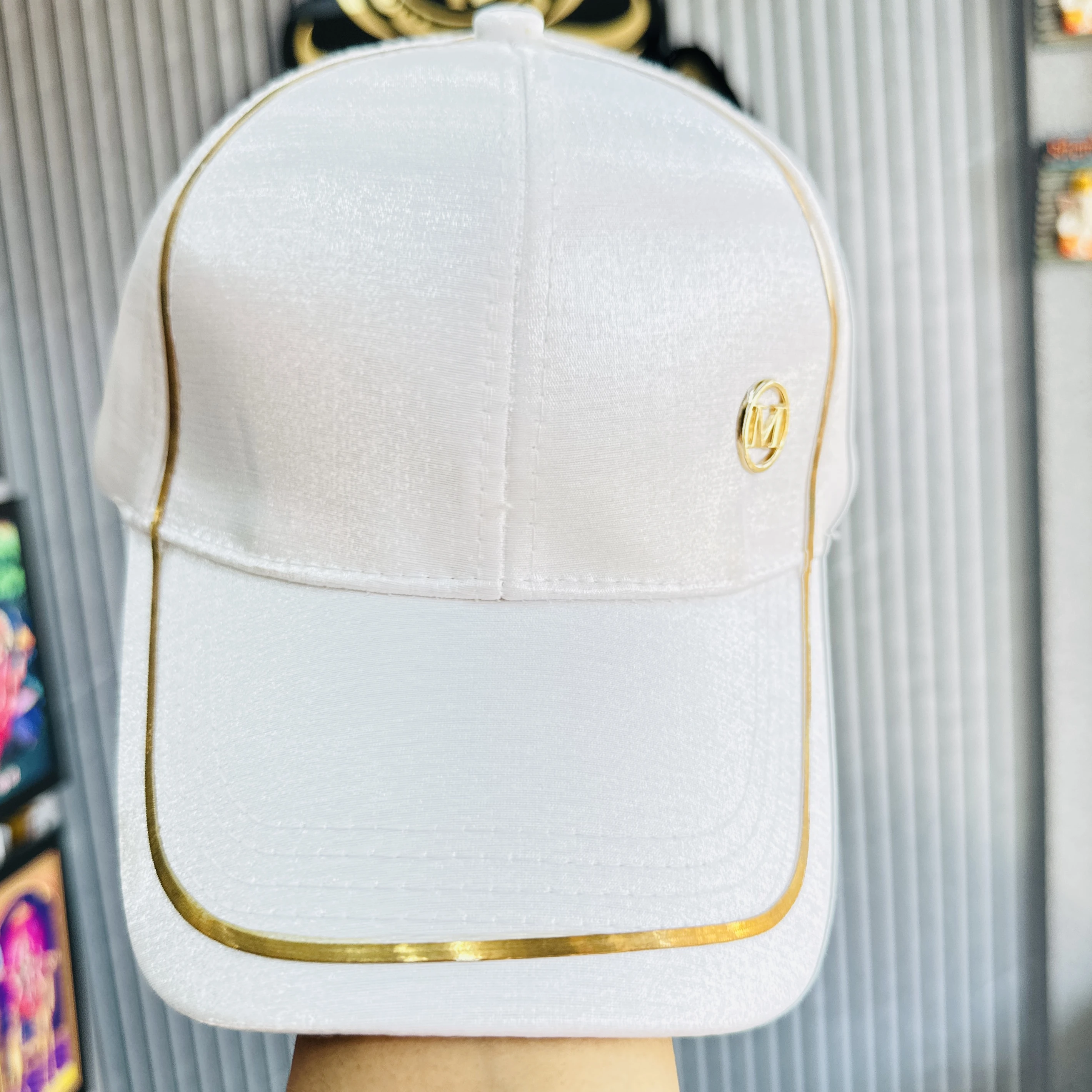 white baseball cap