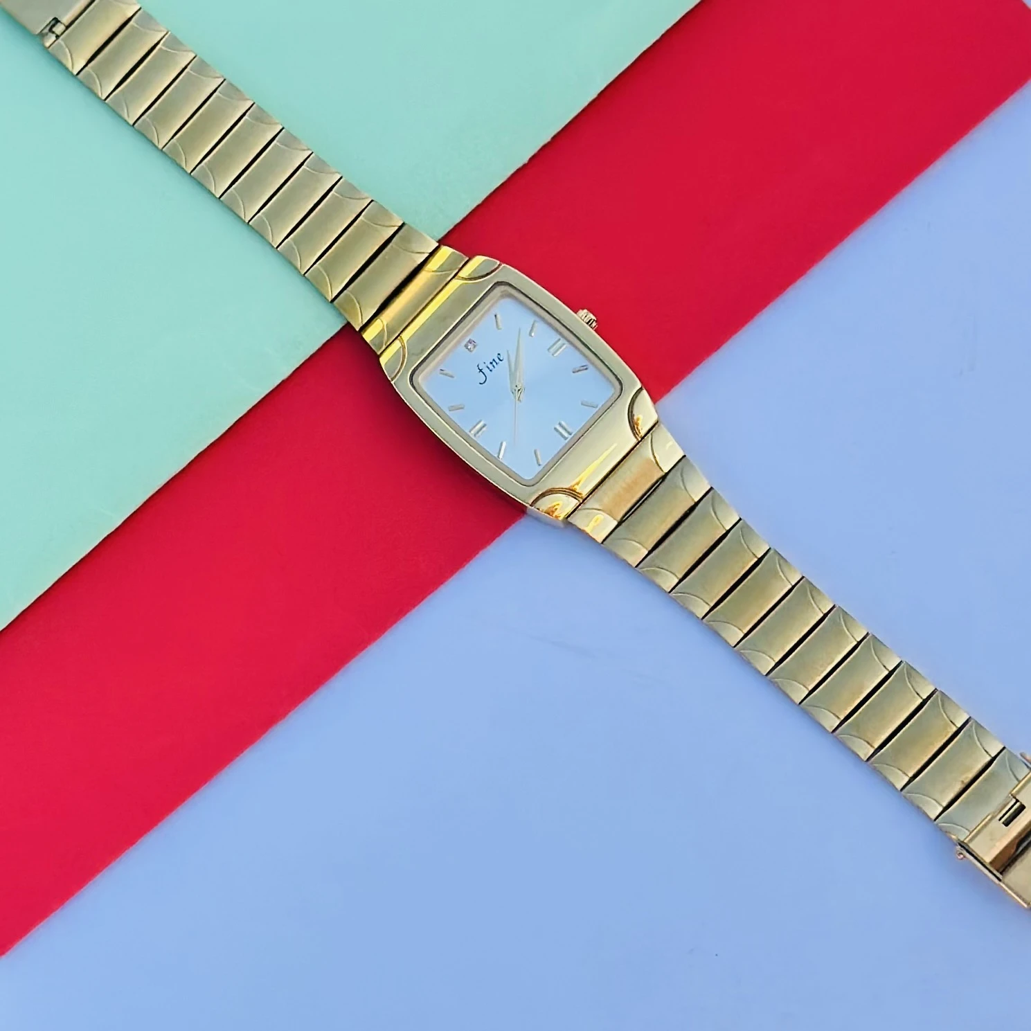 Gold tone analog wrist watch