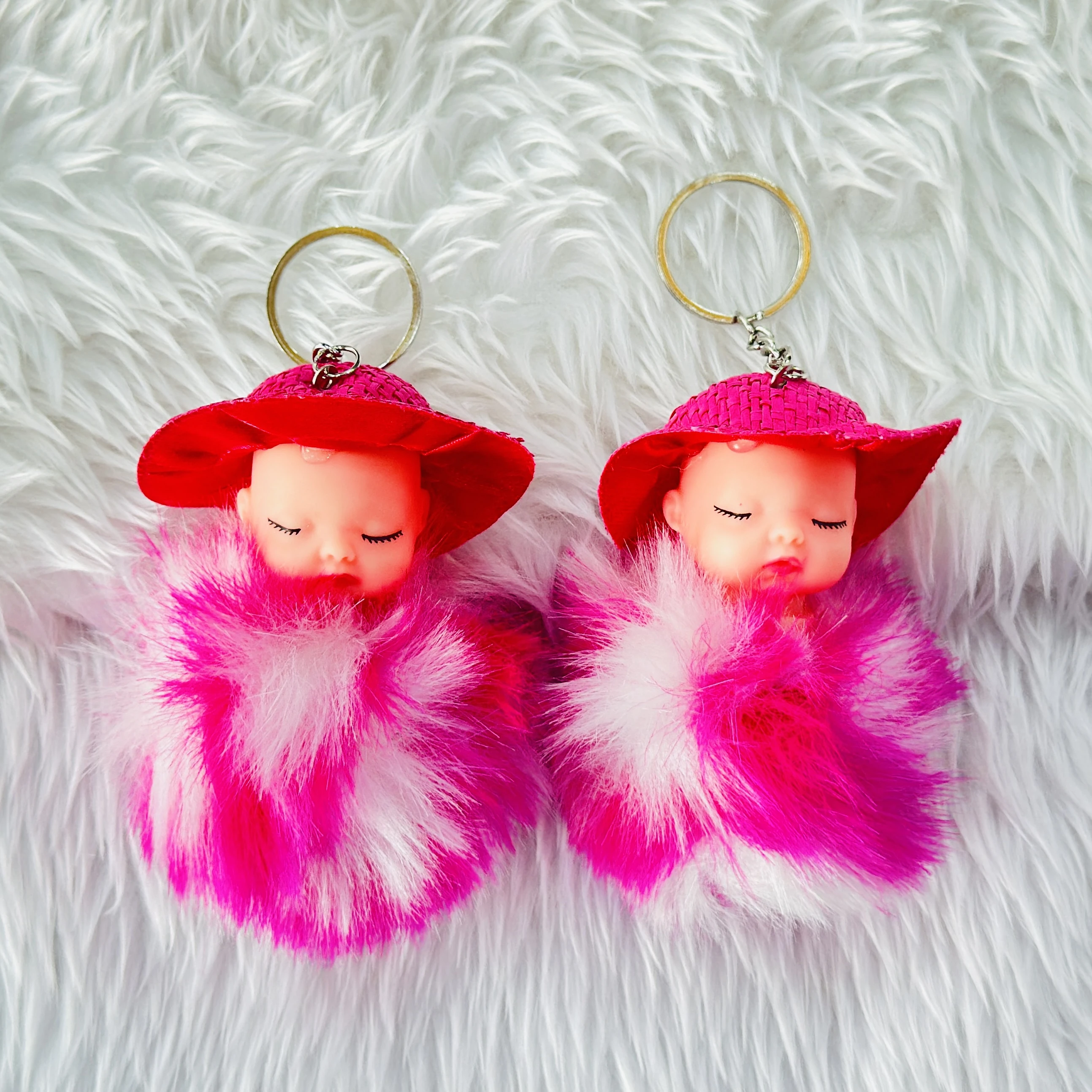fluffy sleeping baby doll keychain