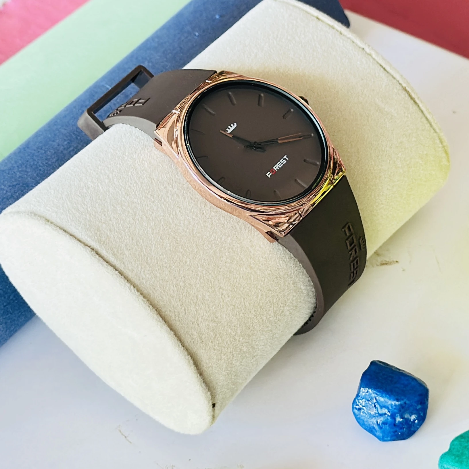 Forest Men's Analog Watch featuring a rose gold-toned round dial and a brown silicone strap