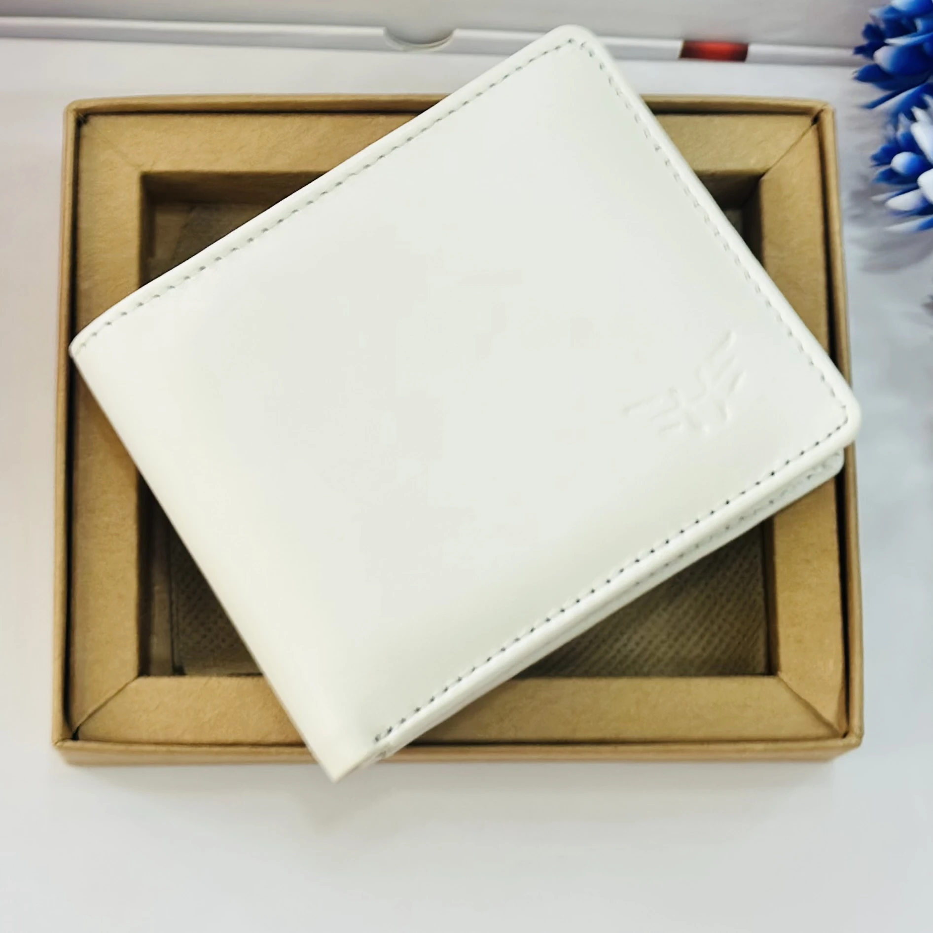 HEROIC men's formal white artificial leather bifold wallet.