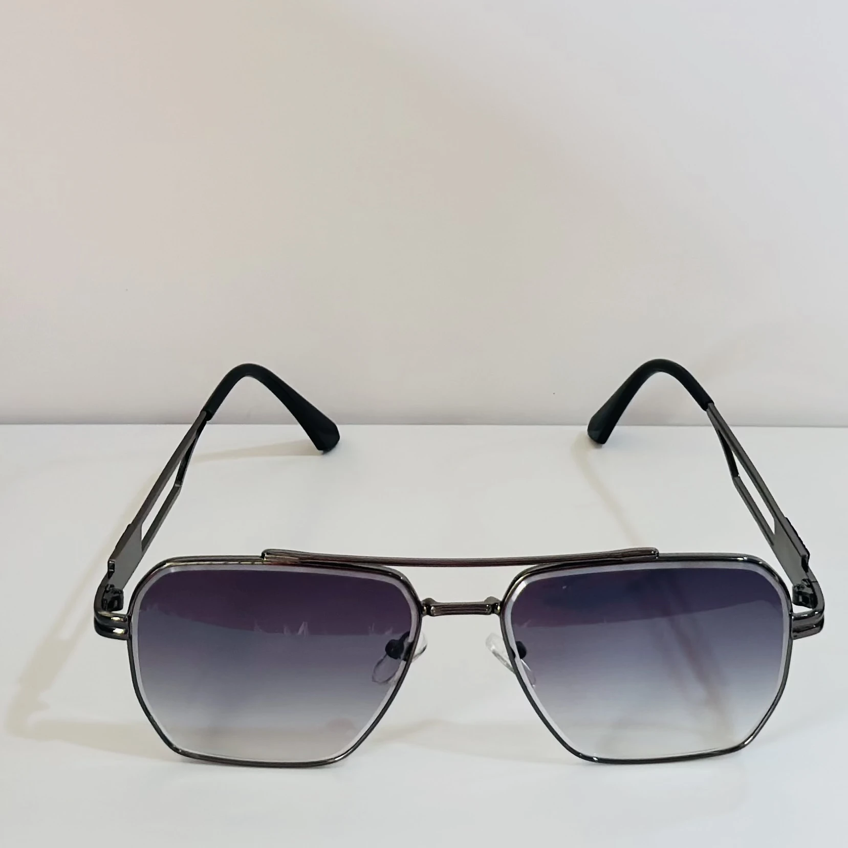 pair of Voyage unisex grey frame purple lens color wayfarer sunglasses.