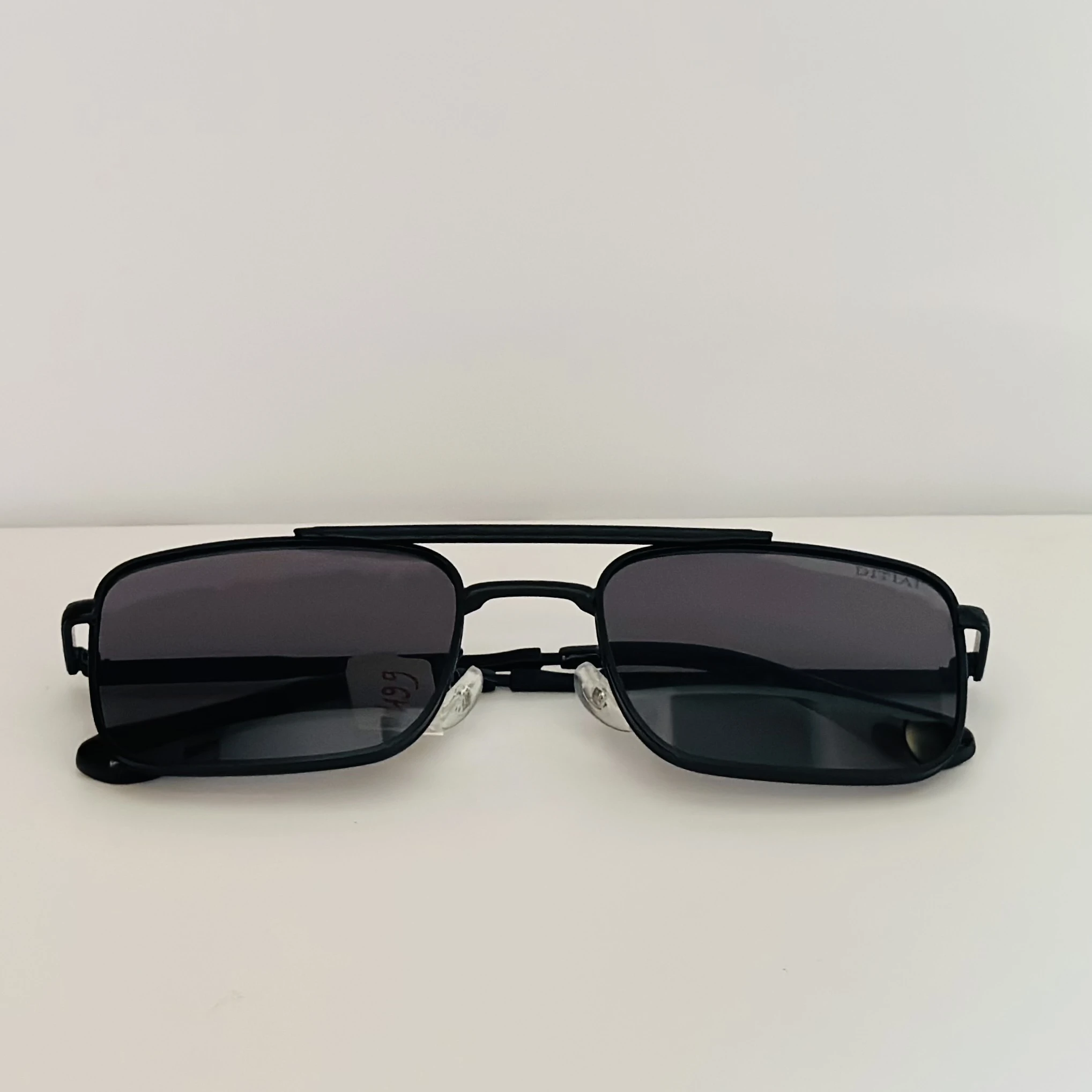 Guess GU00060 sunglasses in matte black with grey lenses.