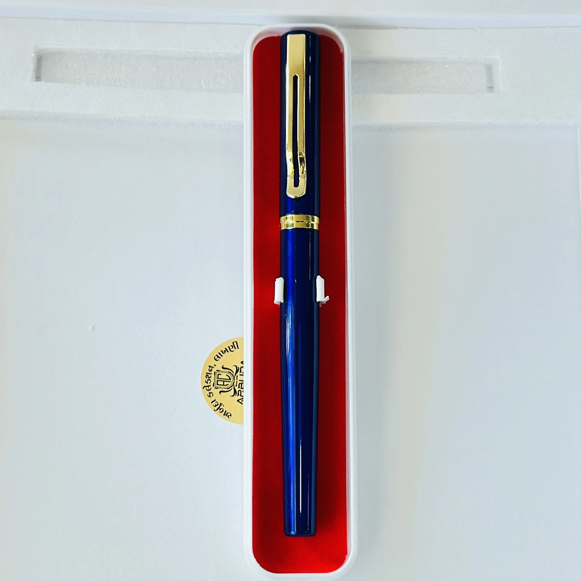 Blue metallic rollerball pen