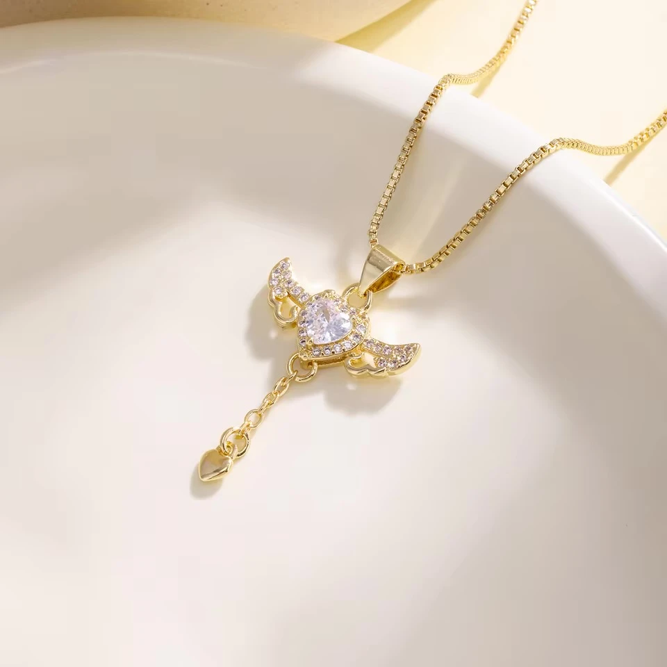 Uniqon golden diamond angel wing pendant