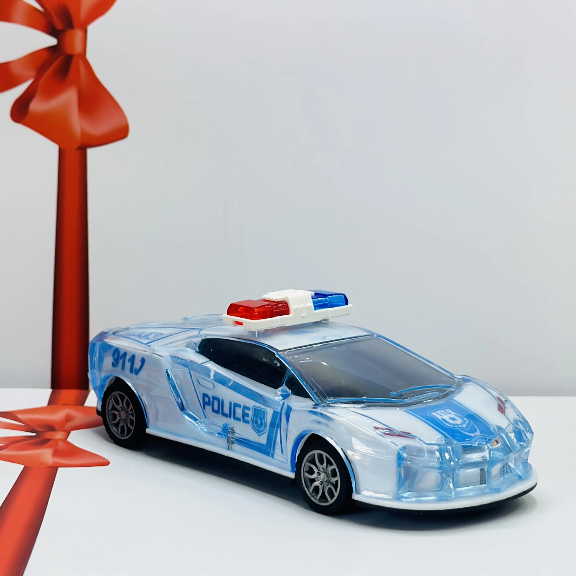 Toy police car with a transparent body and light-up features.