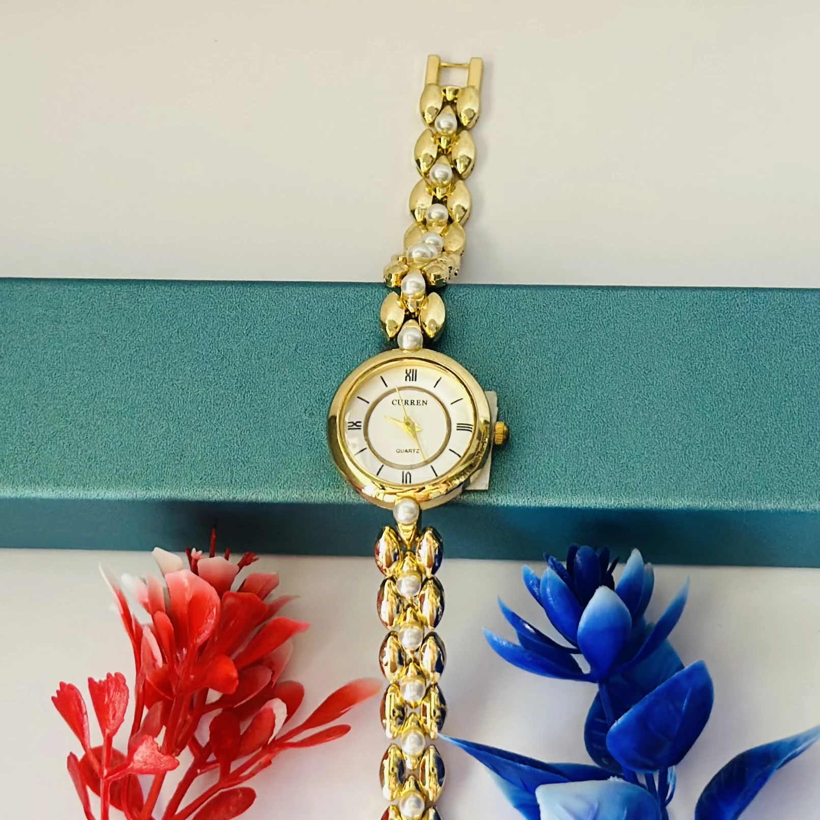 Gold tone women's bracelet watch