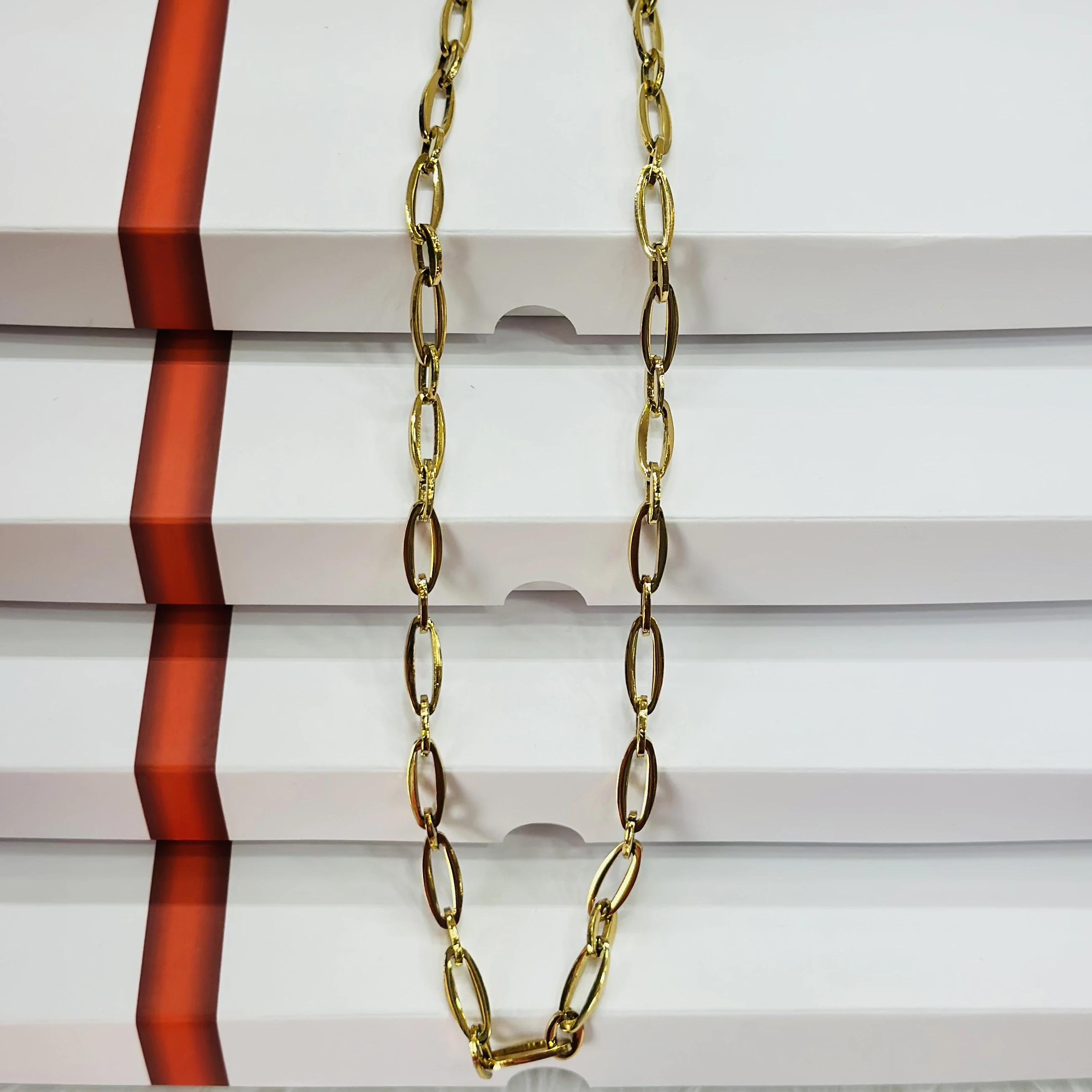Gold -tone oval link long chain necklace.