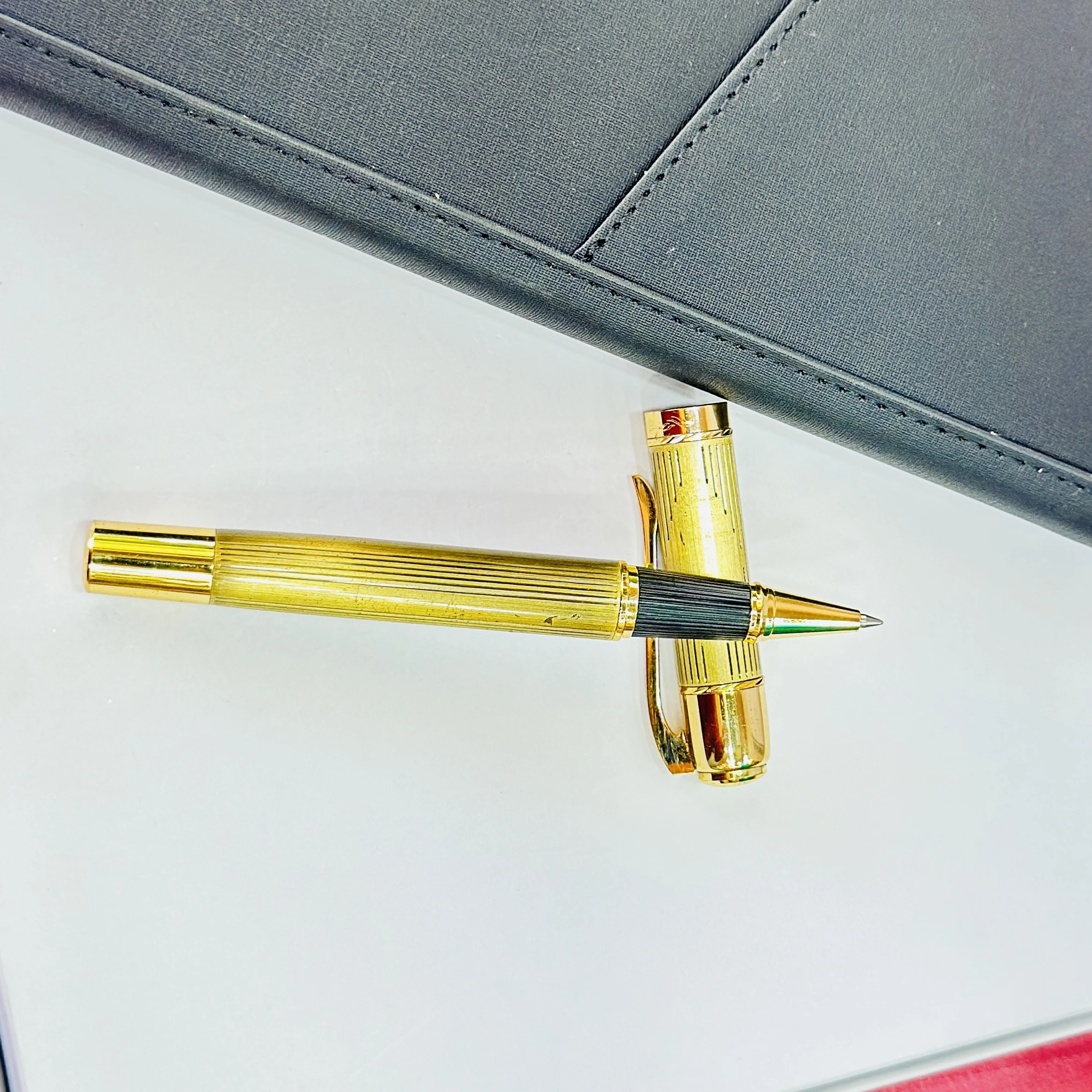 Gold colored Parker ballpoint pen
