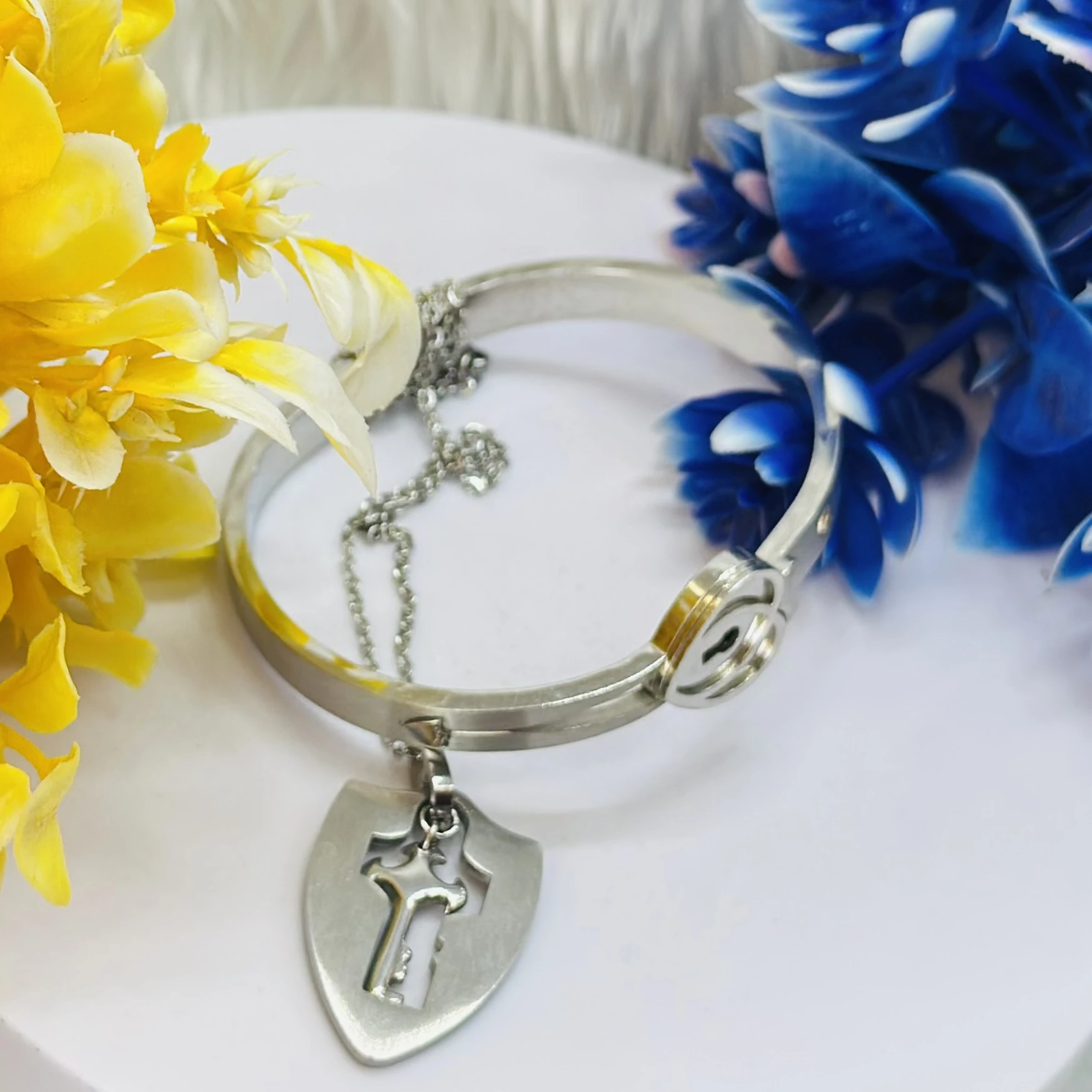 stainless steel lock bracelet and shield key pendant necklace set for couples.