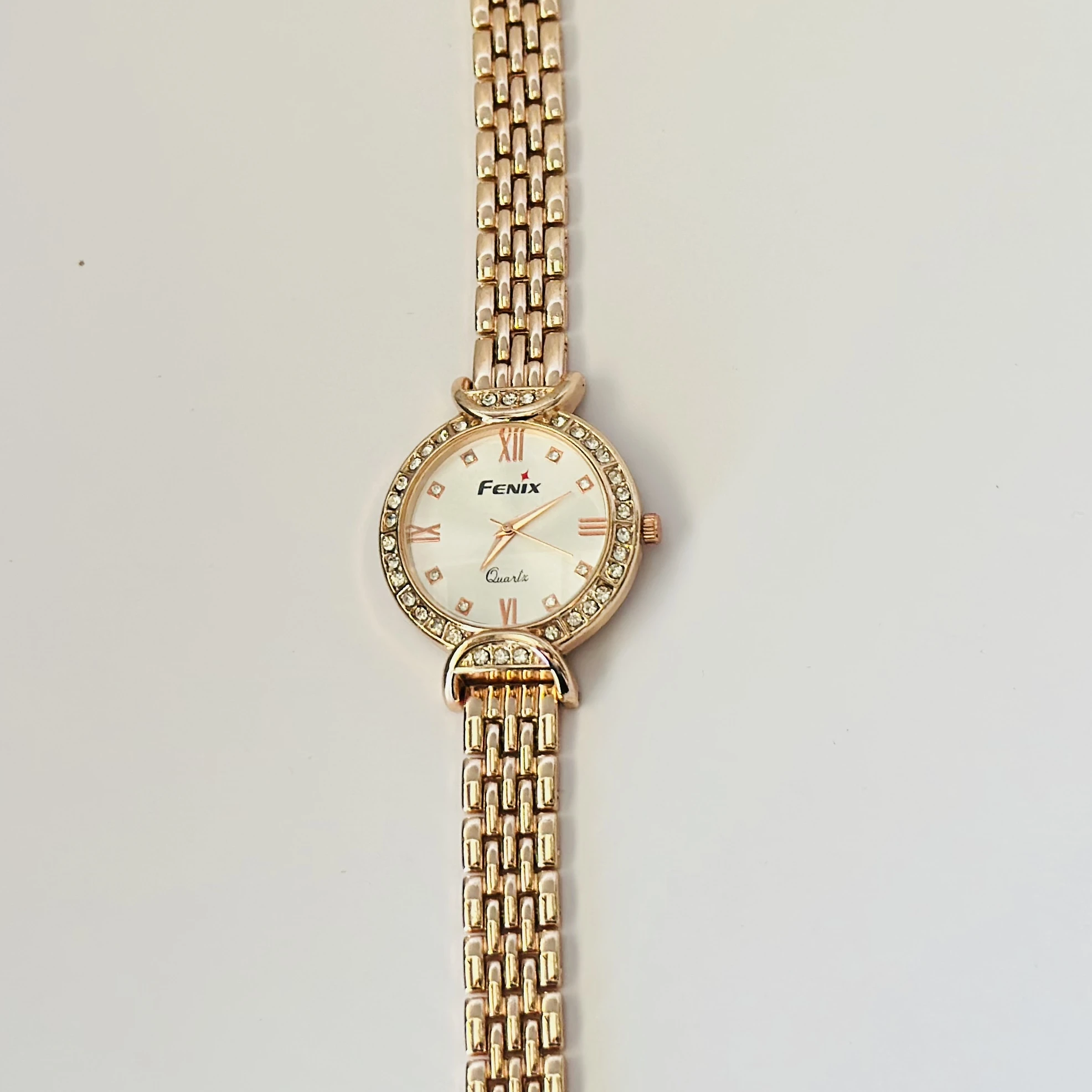 Women’s rose gold-tone quartz watch