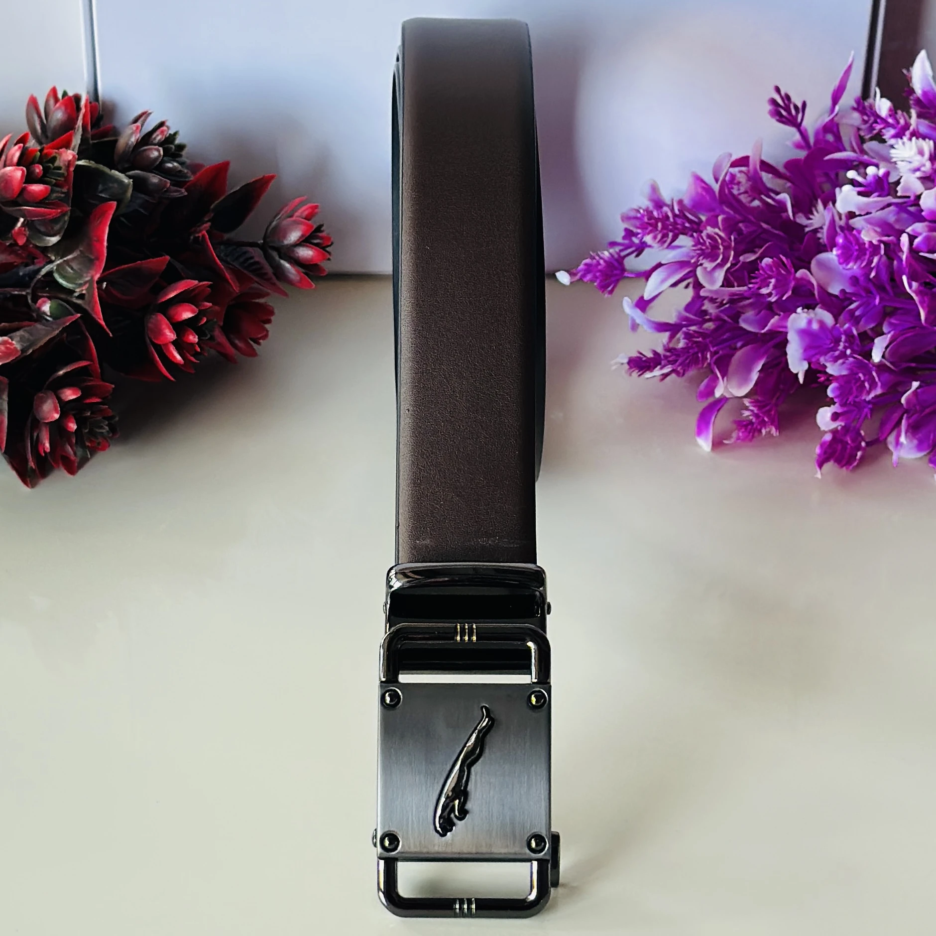 Black leather ratchet belt