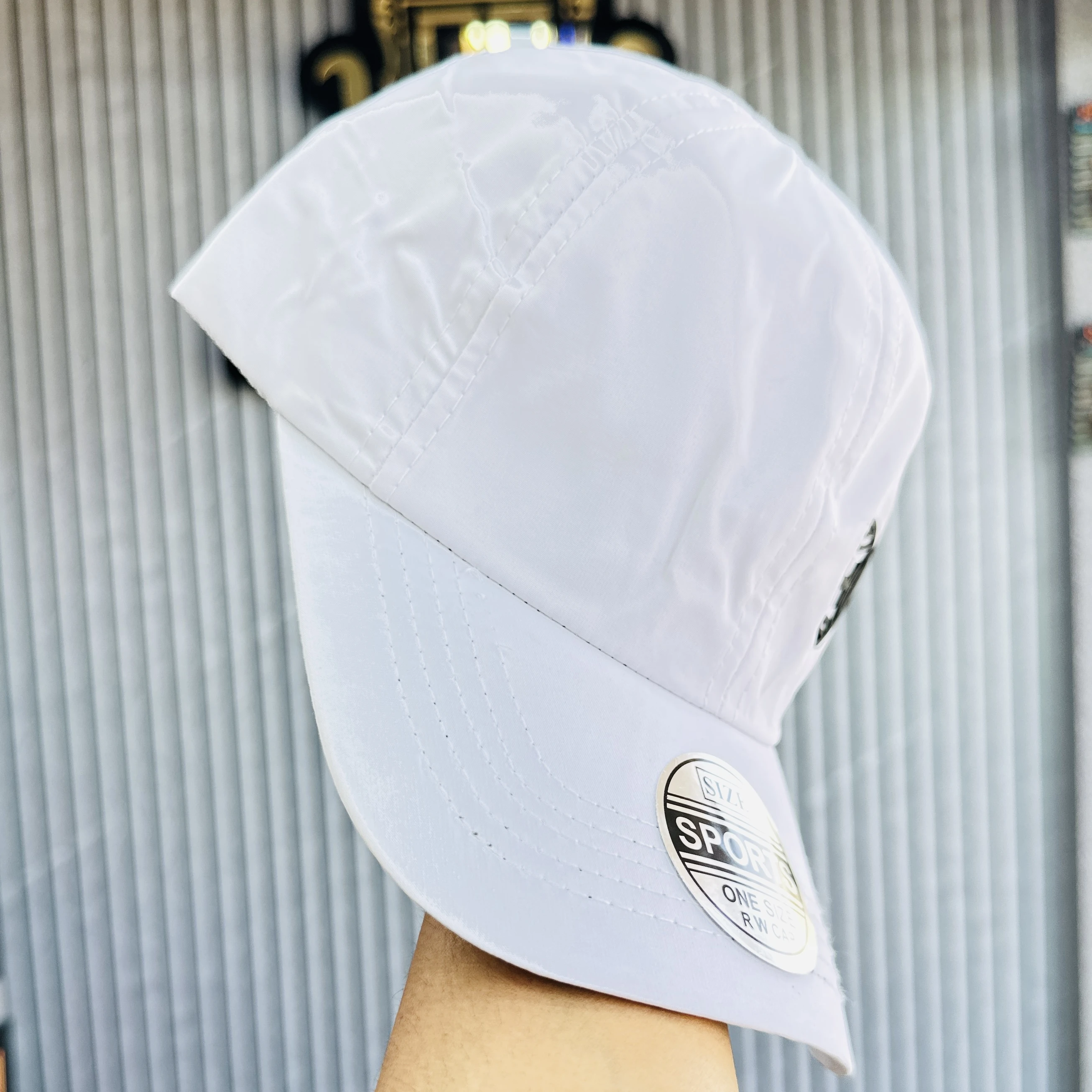 white baseball cap