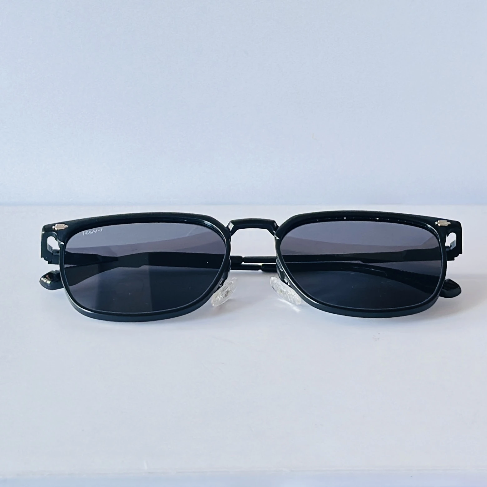 RAw-7 sunglasses feature a sleek black full-rim rectangle frame