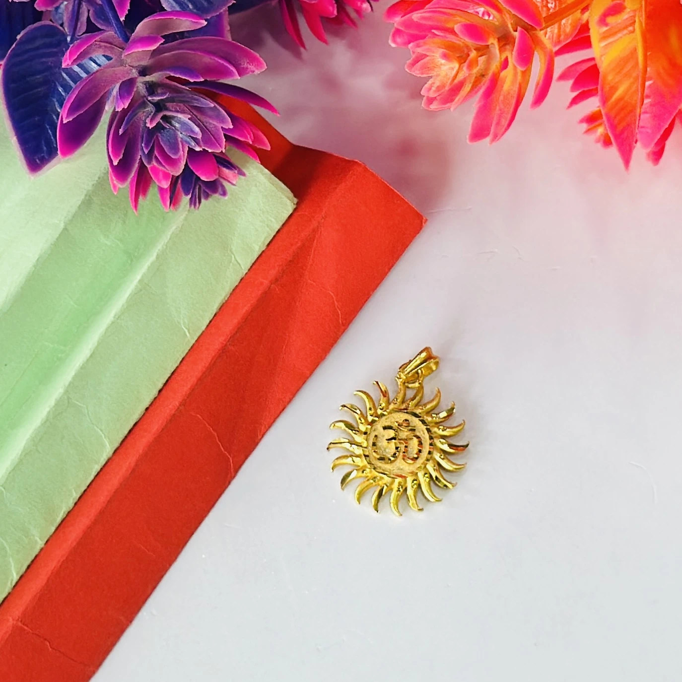 Gold plated Surya sun pendant