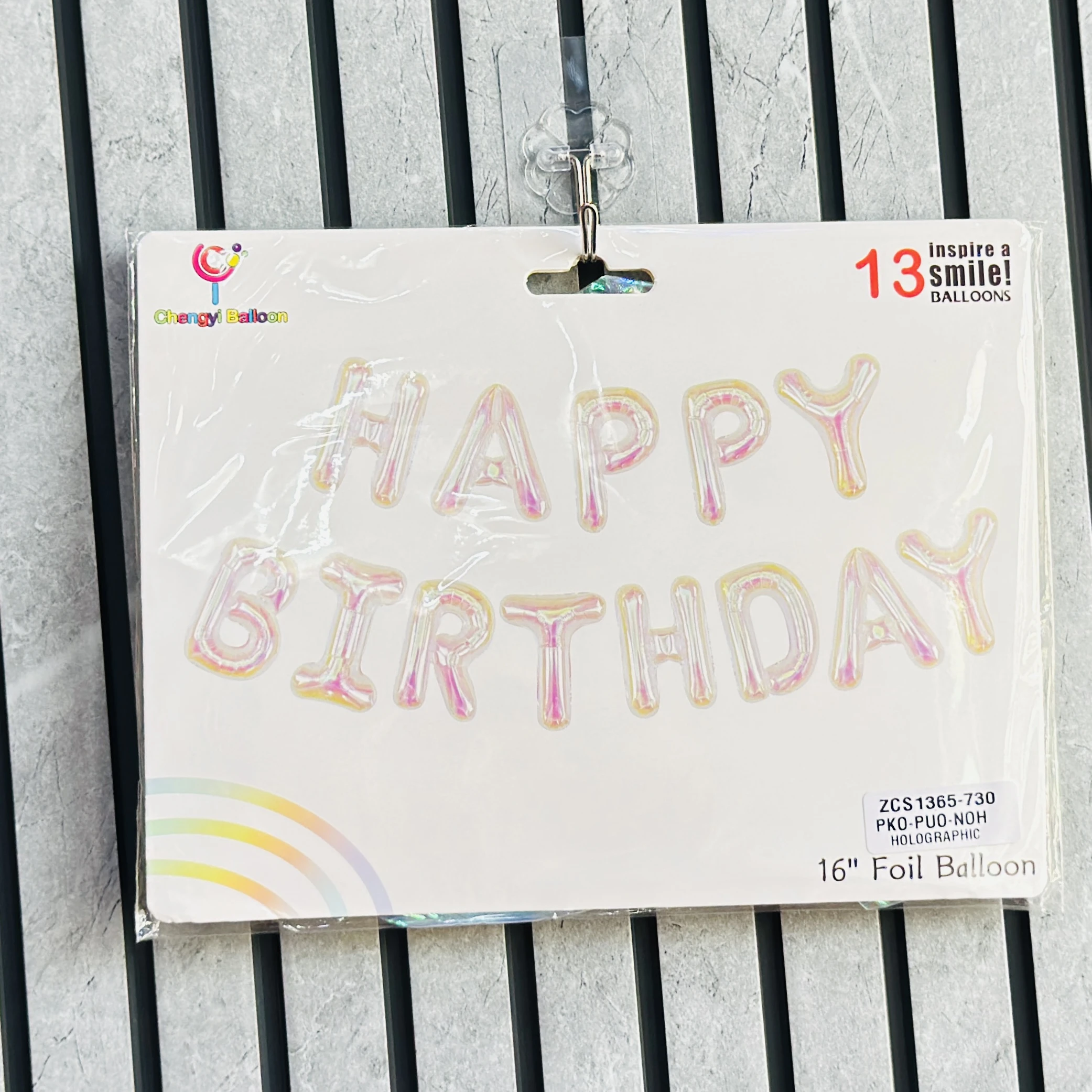 holographic 16-inch "Happy Birthday" letter foil balloon set by Chengyi Balloon.