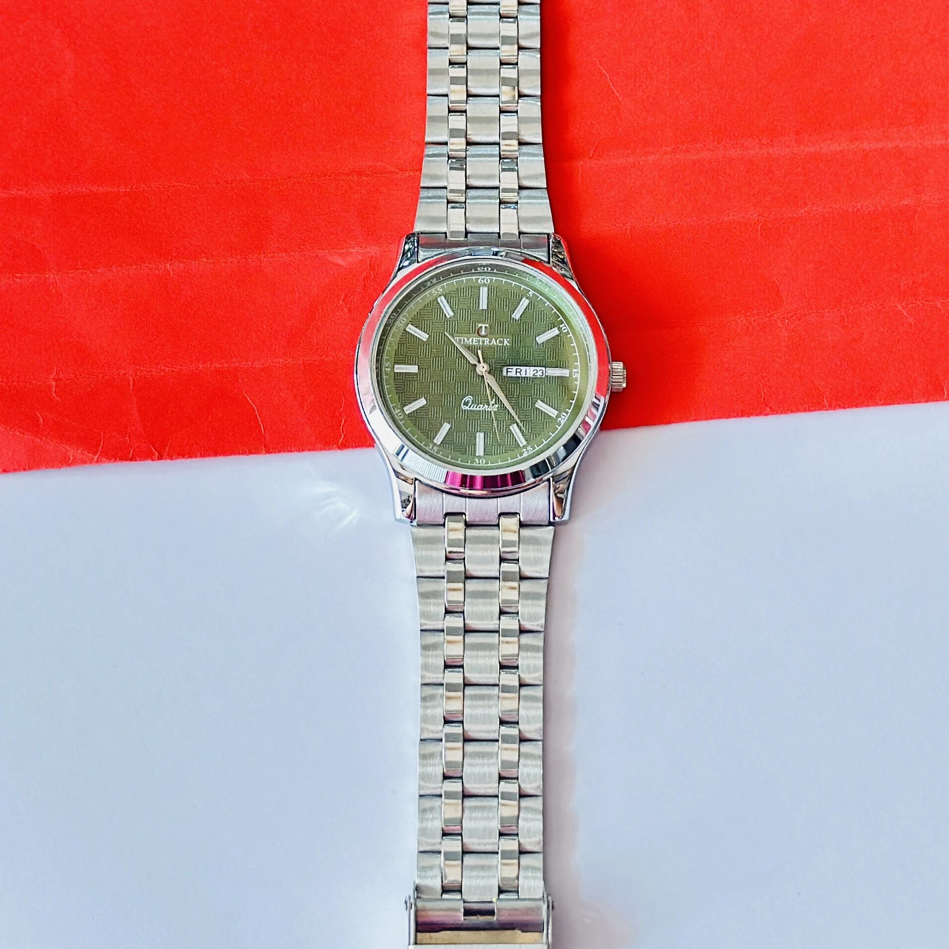 silver-toned stainless steel analogue watch