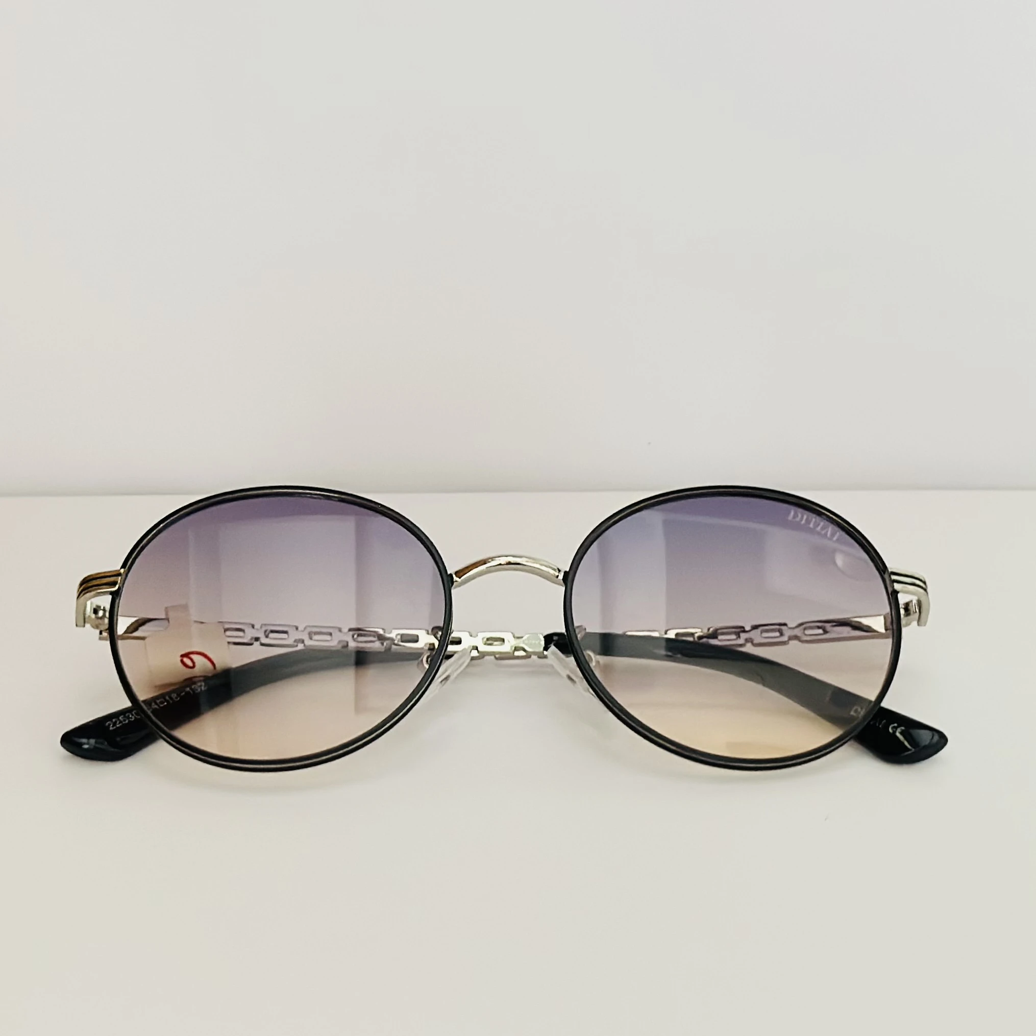 Moncler Tatou ML 0224 sunglasses in  metal with round lenses.