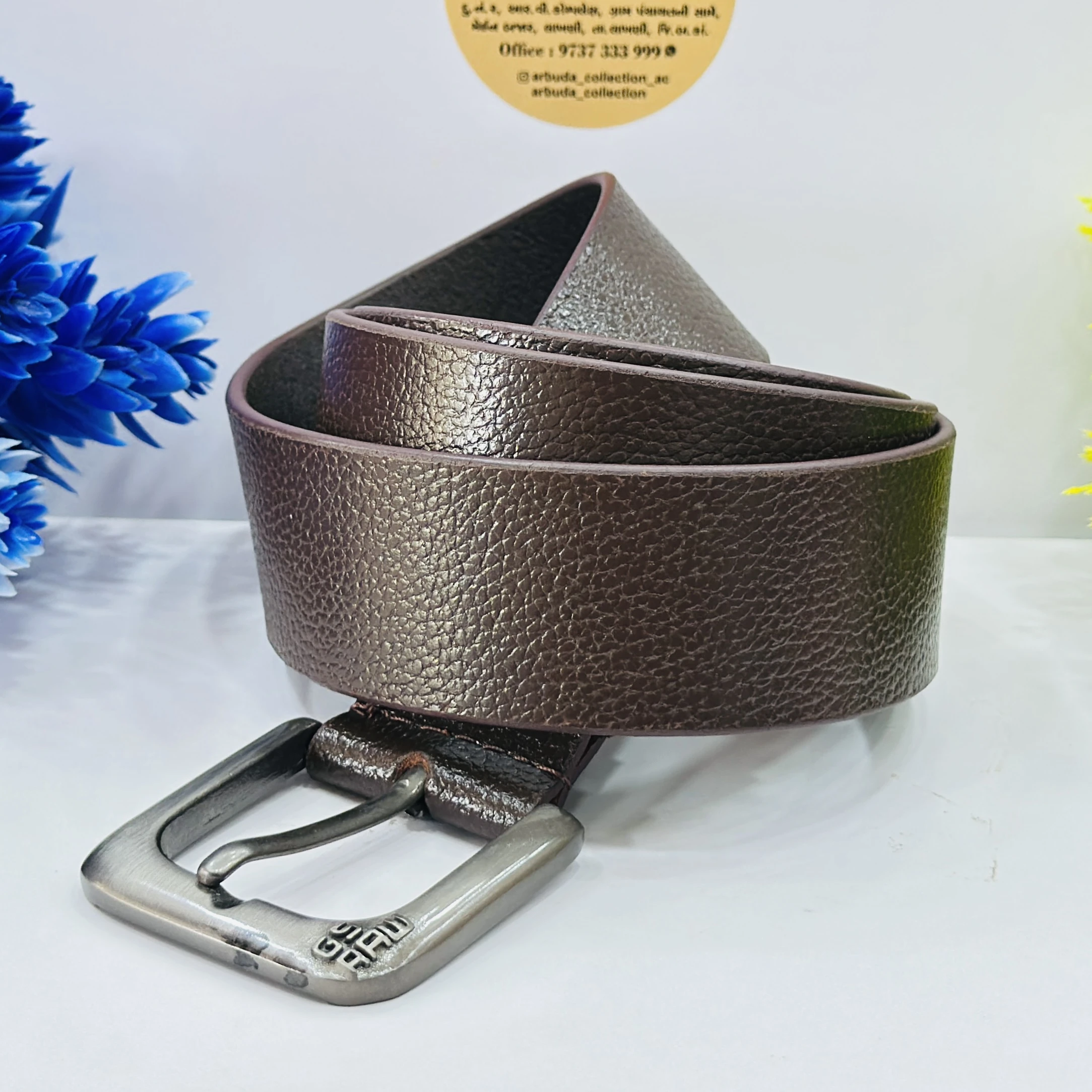 Based on similar products, this is a men's brown leather casual belt.