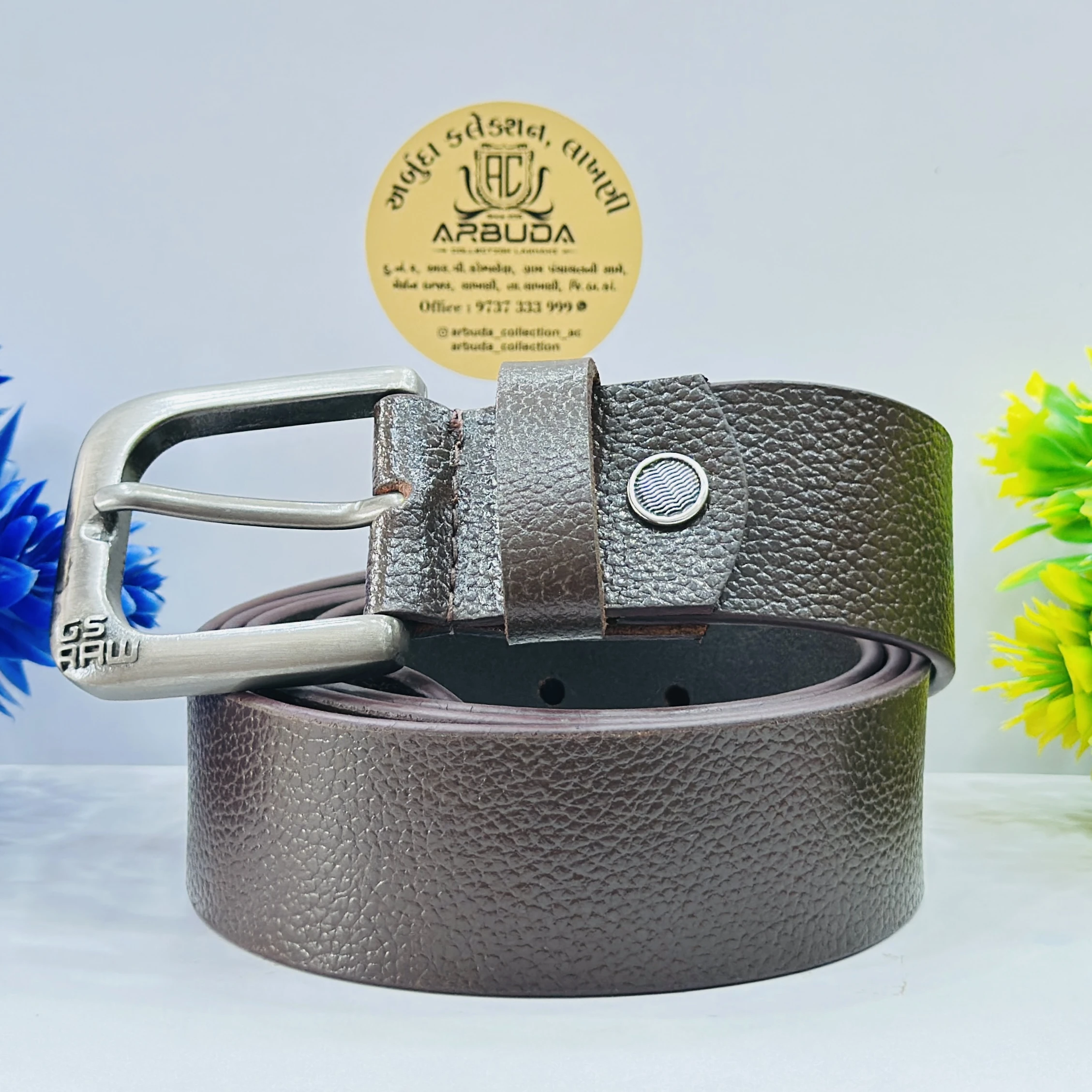 Based on similar products, this is a men's brown leather casual belt.