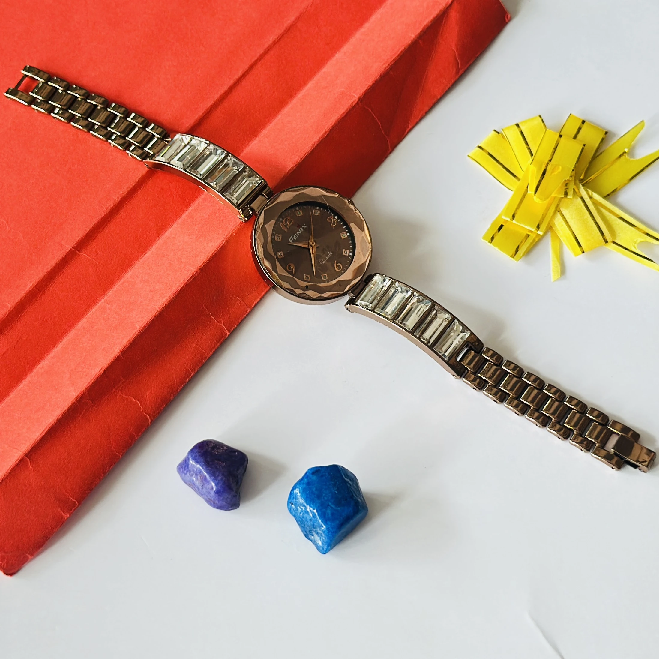Brown Fenix analog watch for women