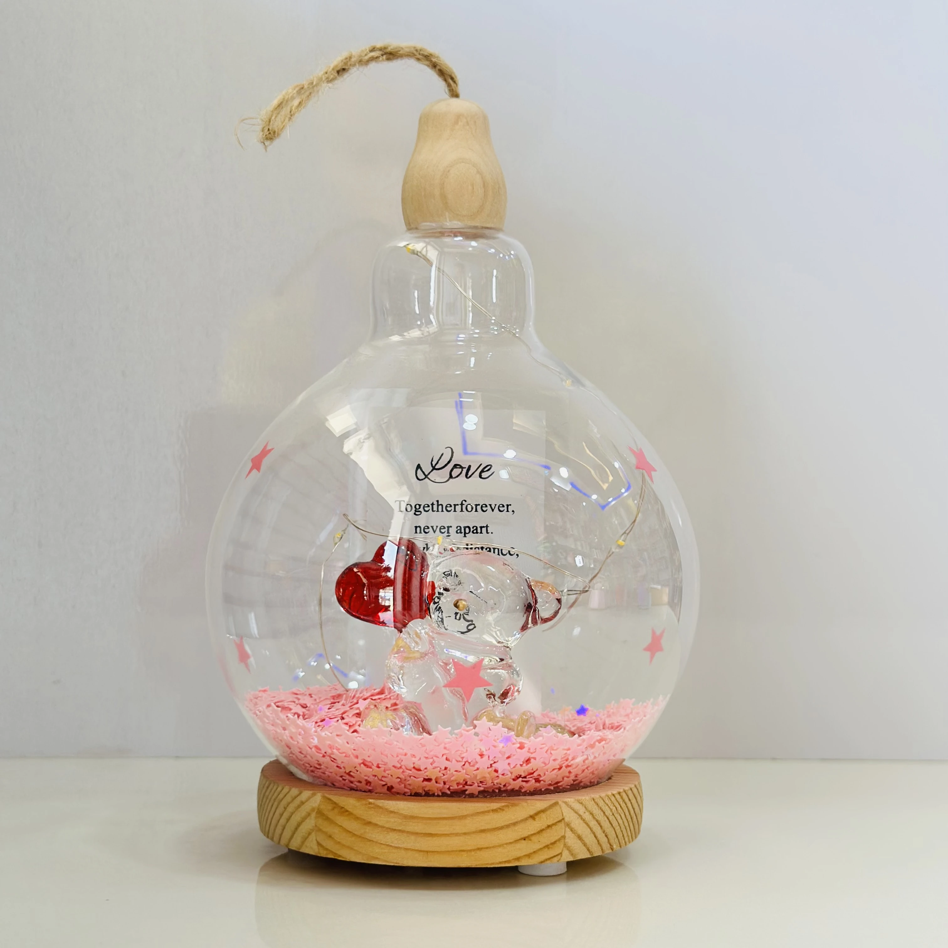 decorative glass dome with LED lights, featuring a couple figurine inside.(SKU-5NELVH)