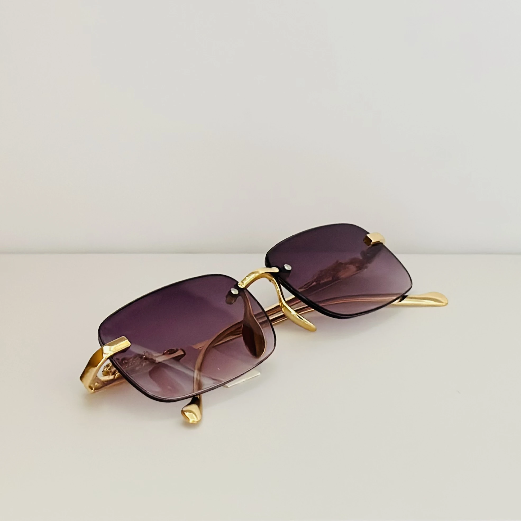 Rimless rectangular sunglasses