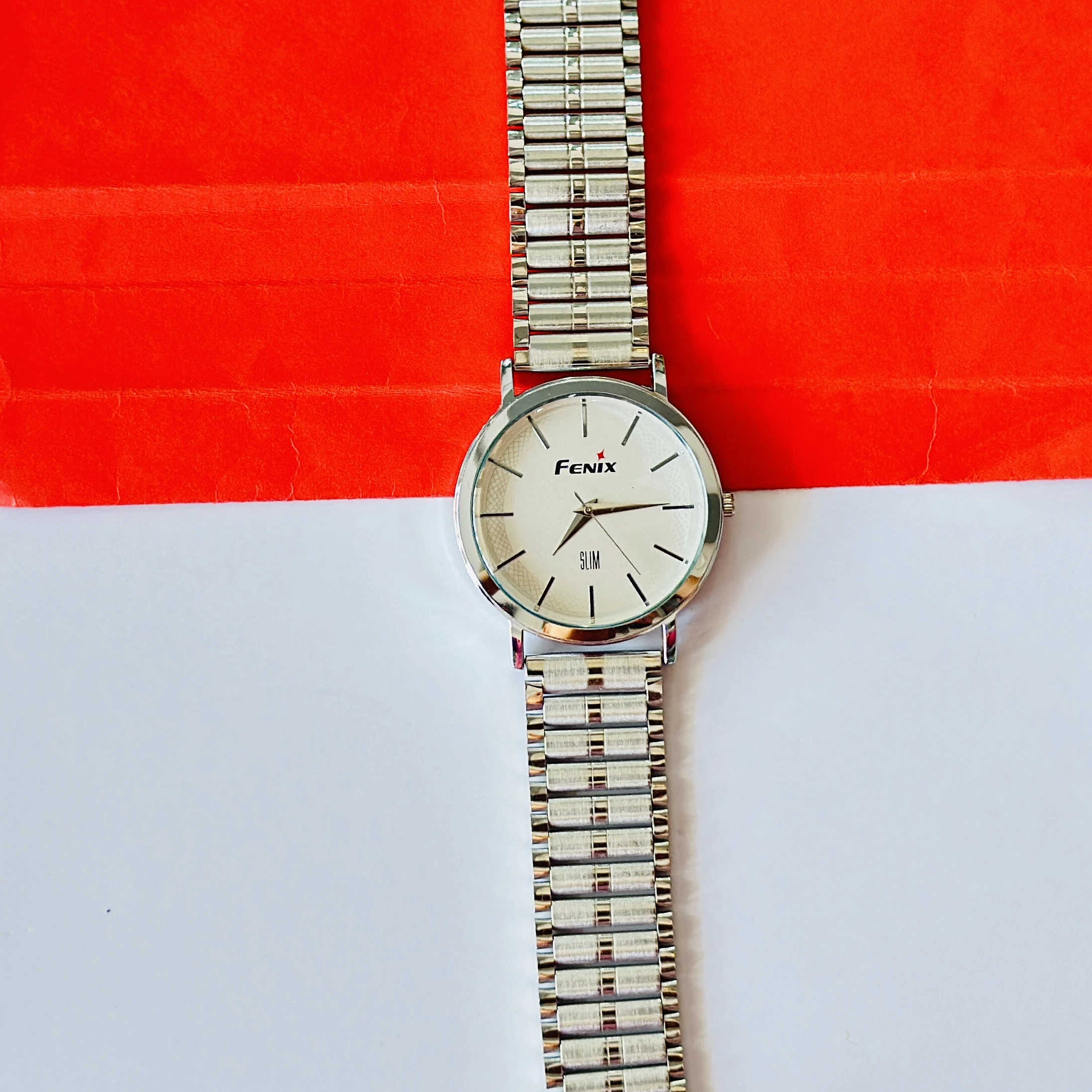 silver-toned stainless steel analogue watch