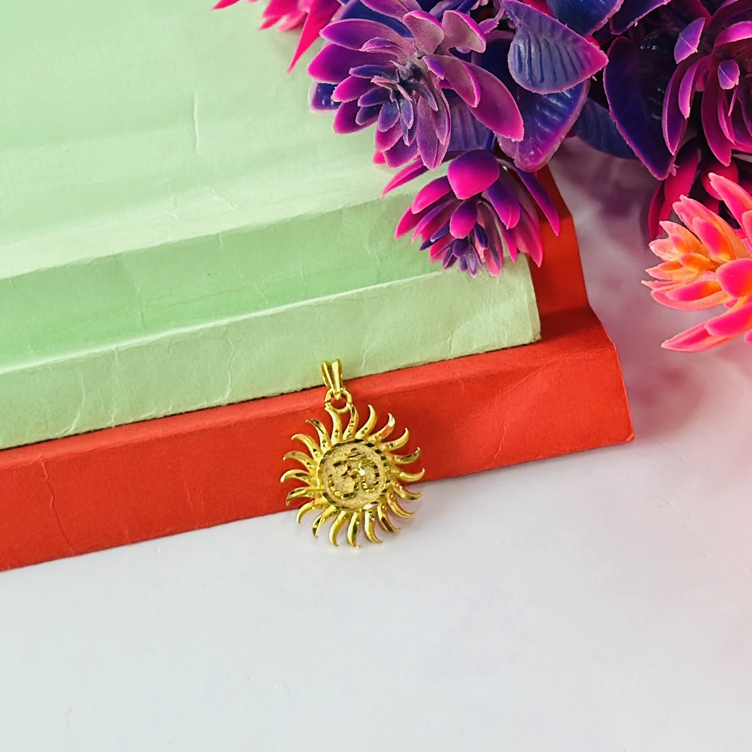 Gold plated Surya sun pendant