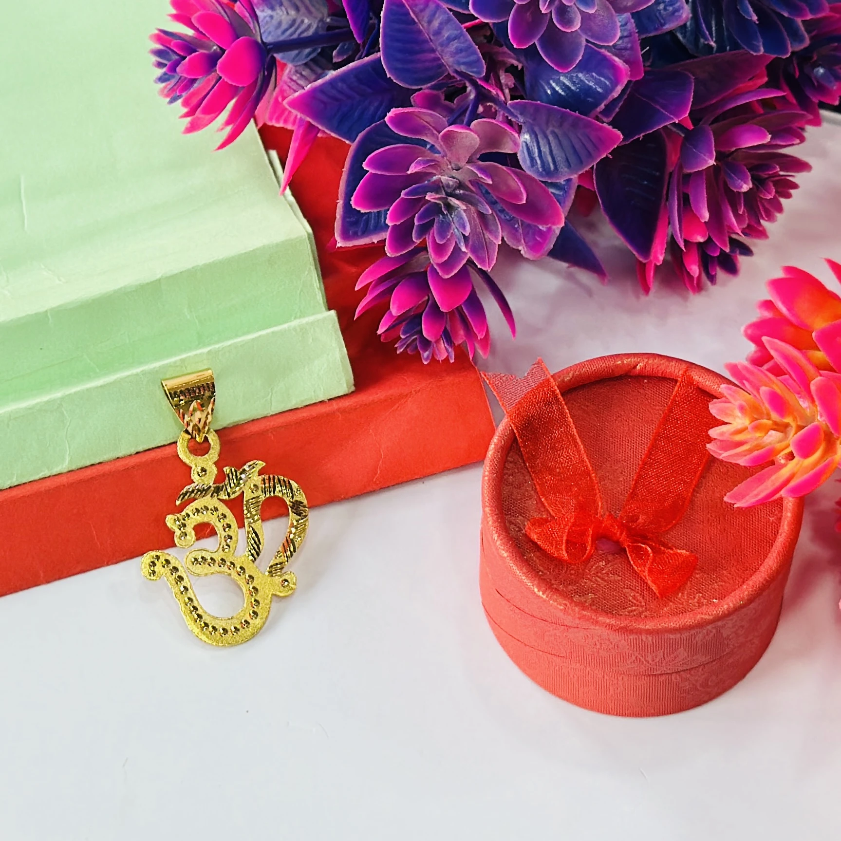 Gold plated 'Om' symbol pendant