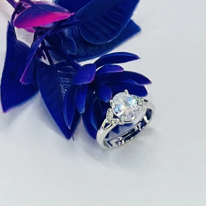 sterling silver or white gold diamond or moissanite engagement ring
