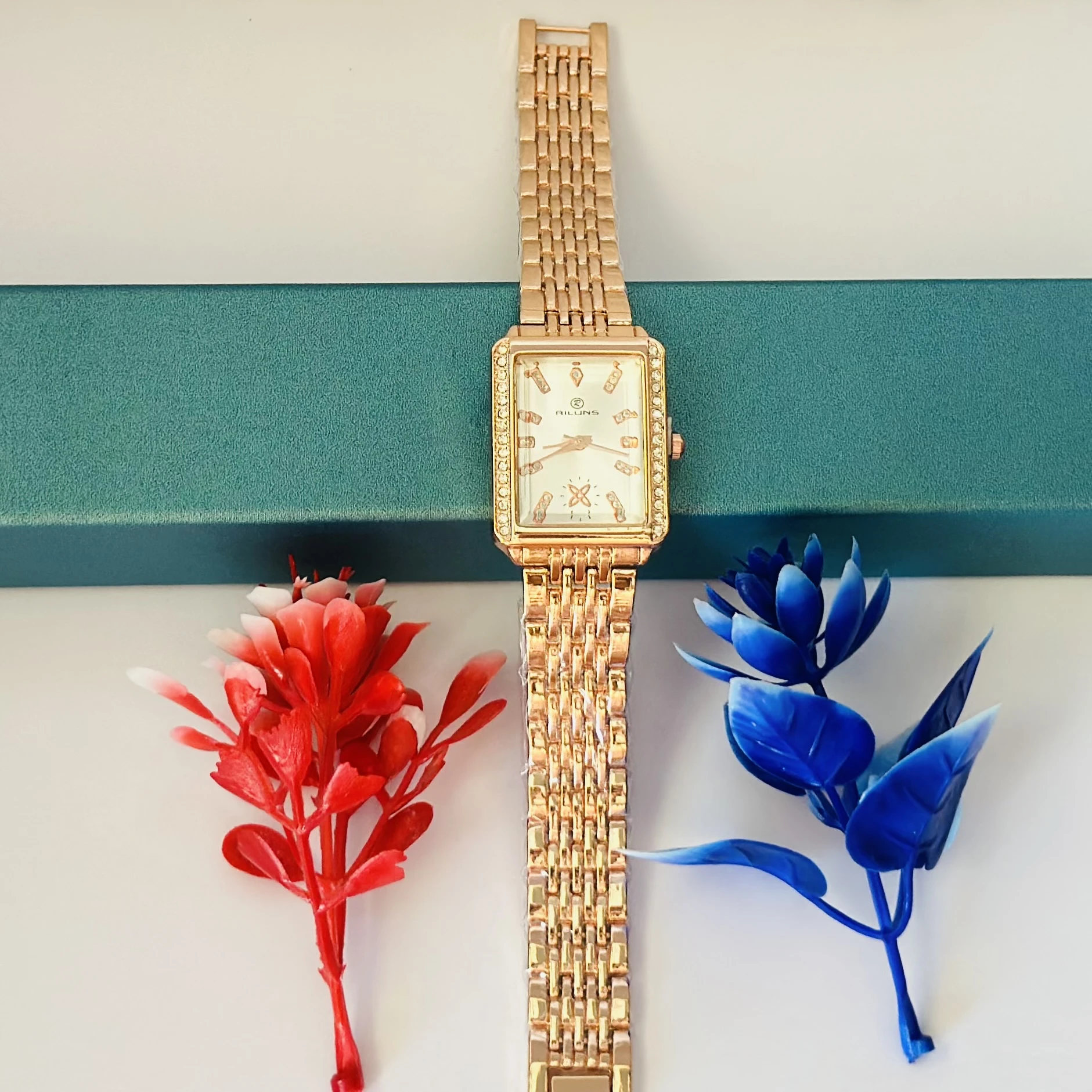 Rose gold-tone rectangular watch