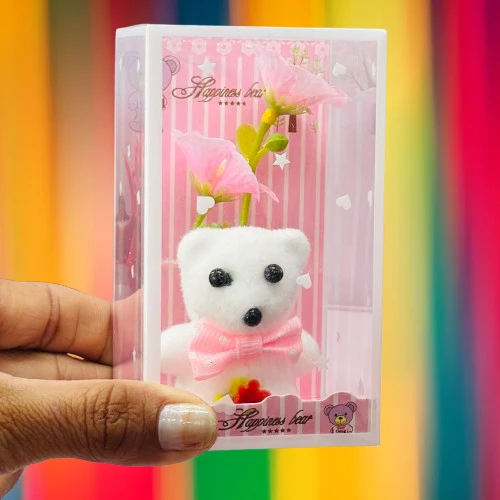 White teddy bear and artificial flower gift set