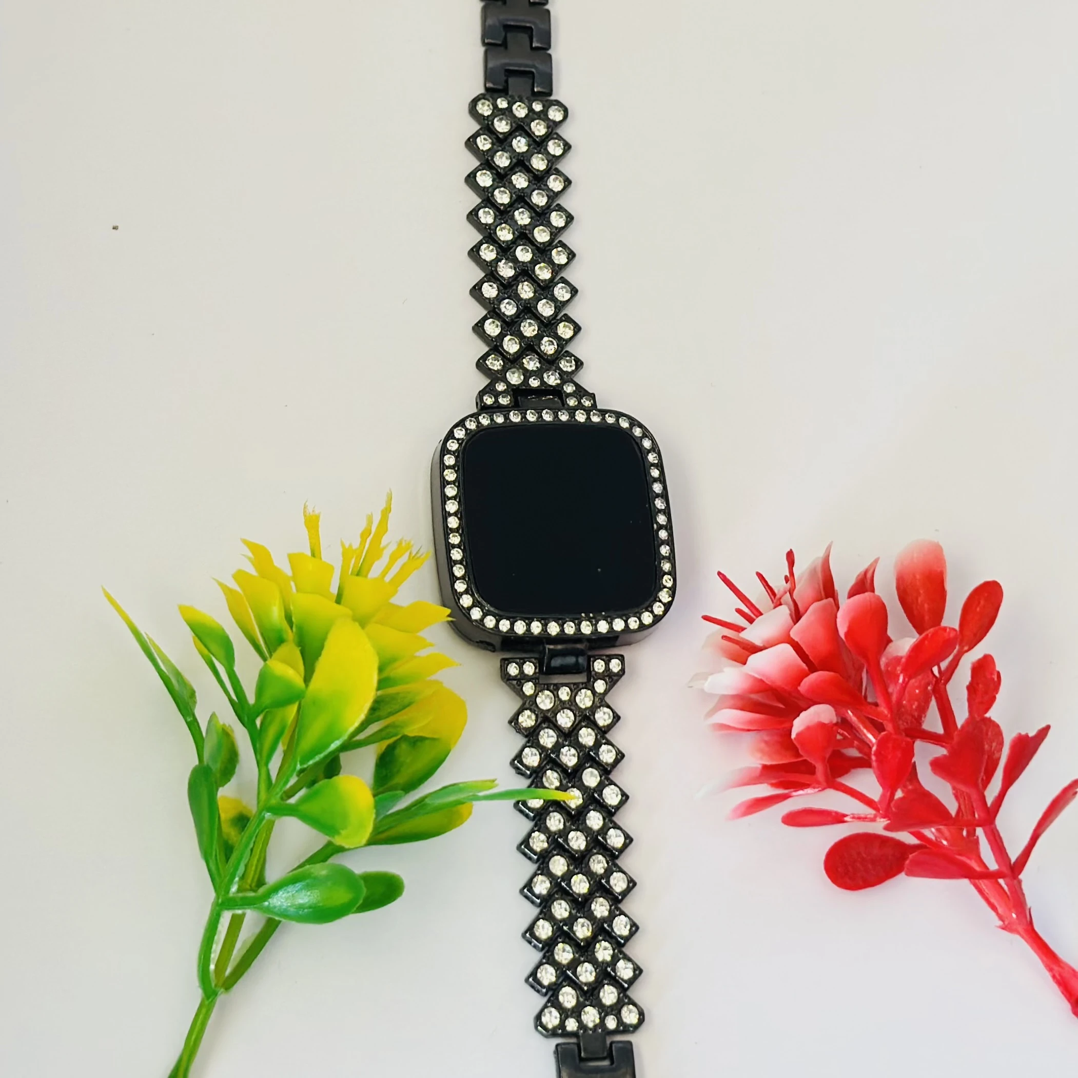 Black LED digital watch with a rhinestone bracelet.